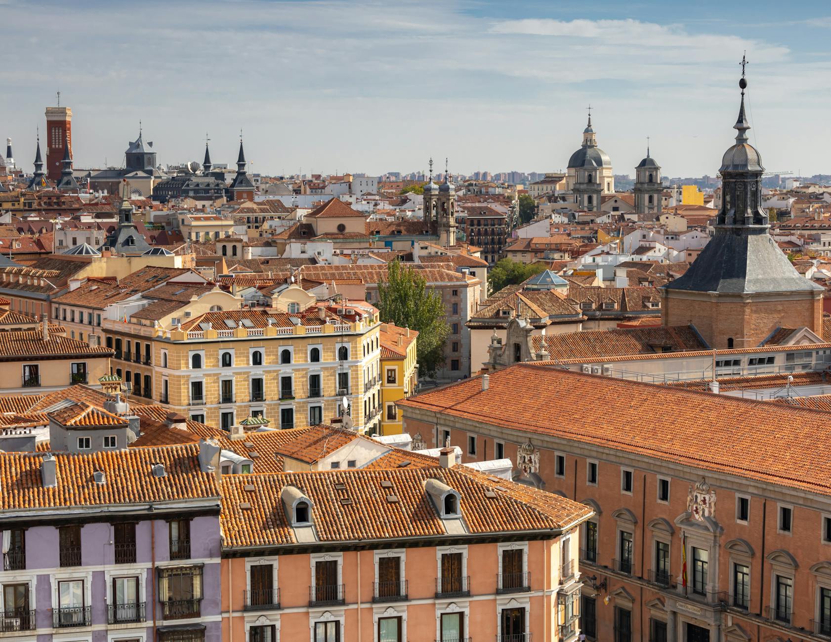 A captivating aerial view of Madrid's historic rooftops with iconic architectural landmarks.