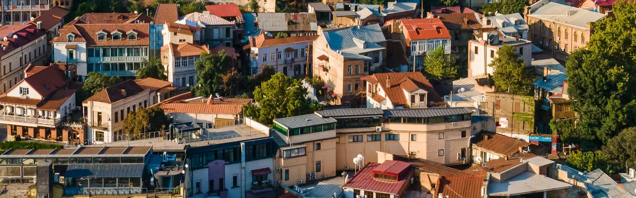 Vibrant aerial view showcasing the diverse architecture of Tbilisi, Georgia.