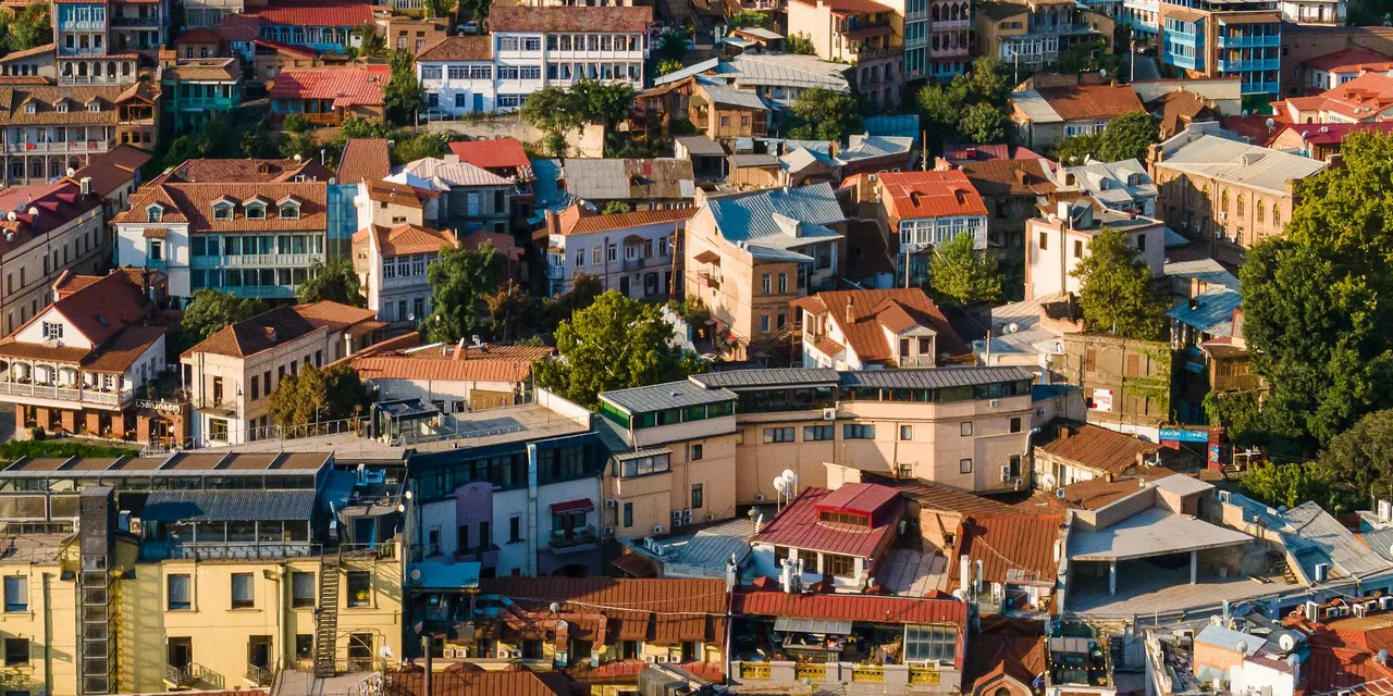 Vibrant aerial view showcasing the diverse architecture of Tbilisi, Georgia.