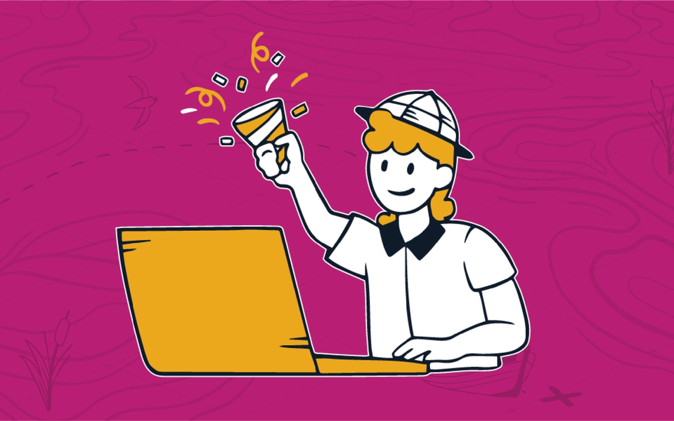 Smiling cartoon character with a collared white polo shirt and a pith helmet waving a celebration cracker while sitting in front of a
