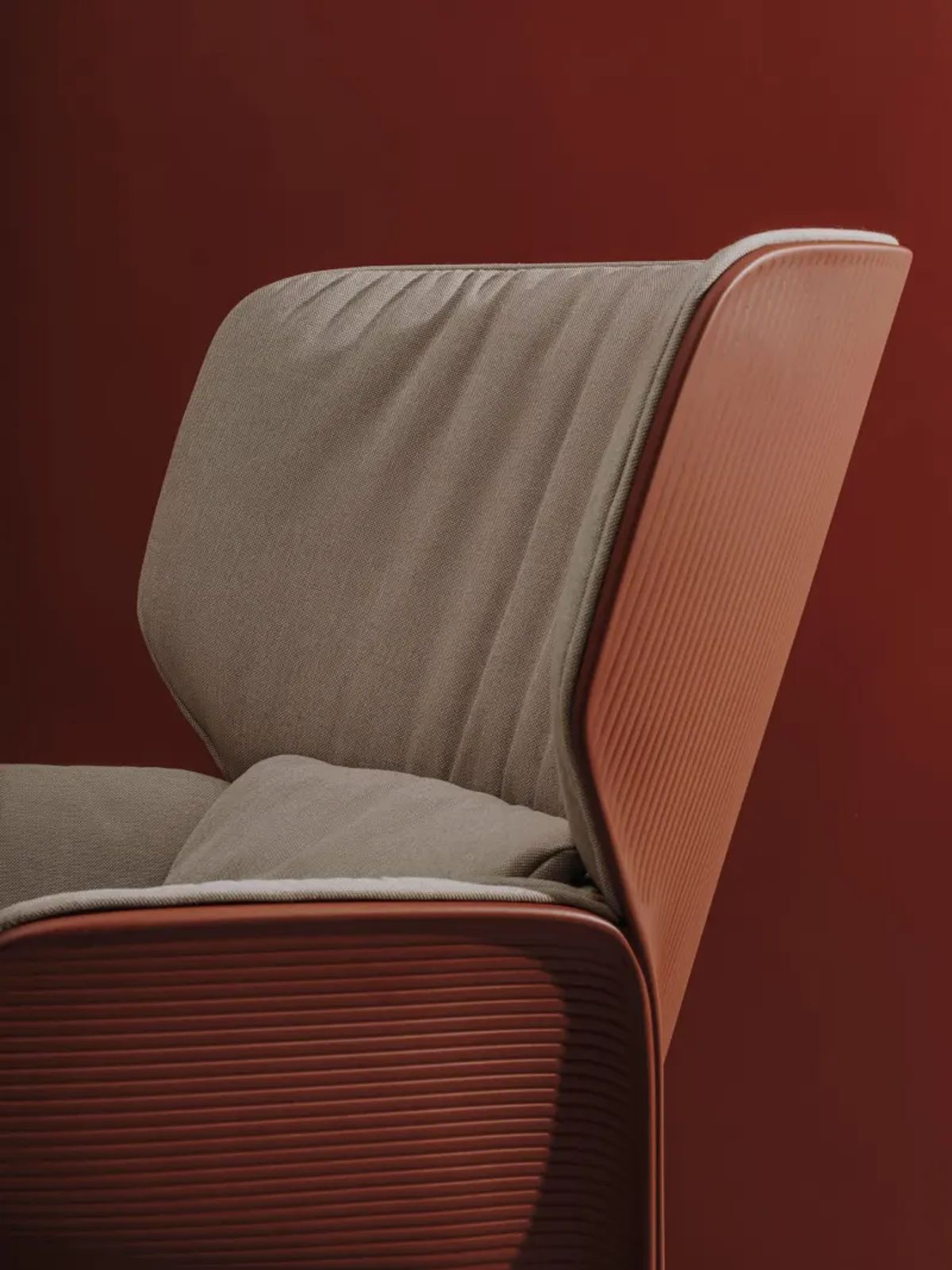 Bio polymer lounge chair with upholstered shell and aluminum swivel base