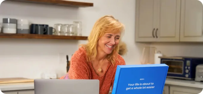 Woman receiving GOV+ Passport renewal kit in the mail