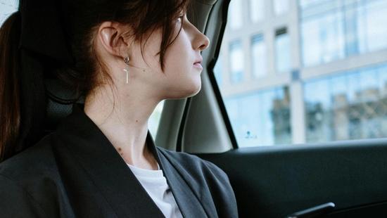 A woman listening to music