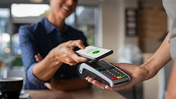 Contactless mobile payment at checkout.