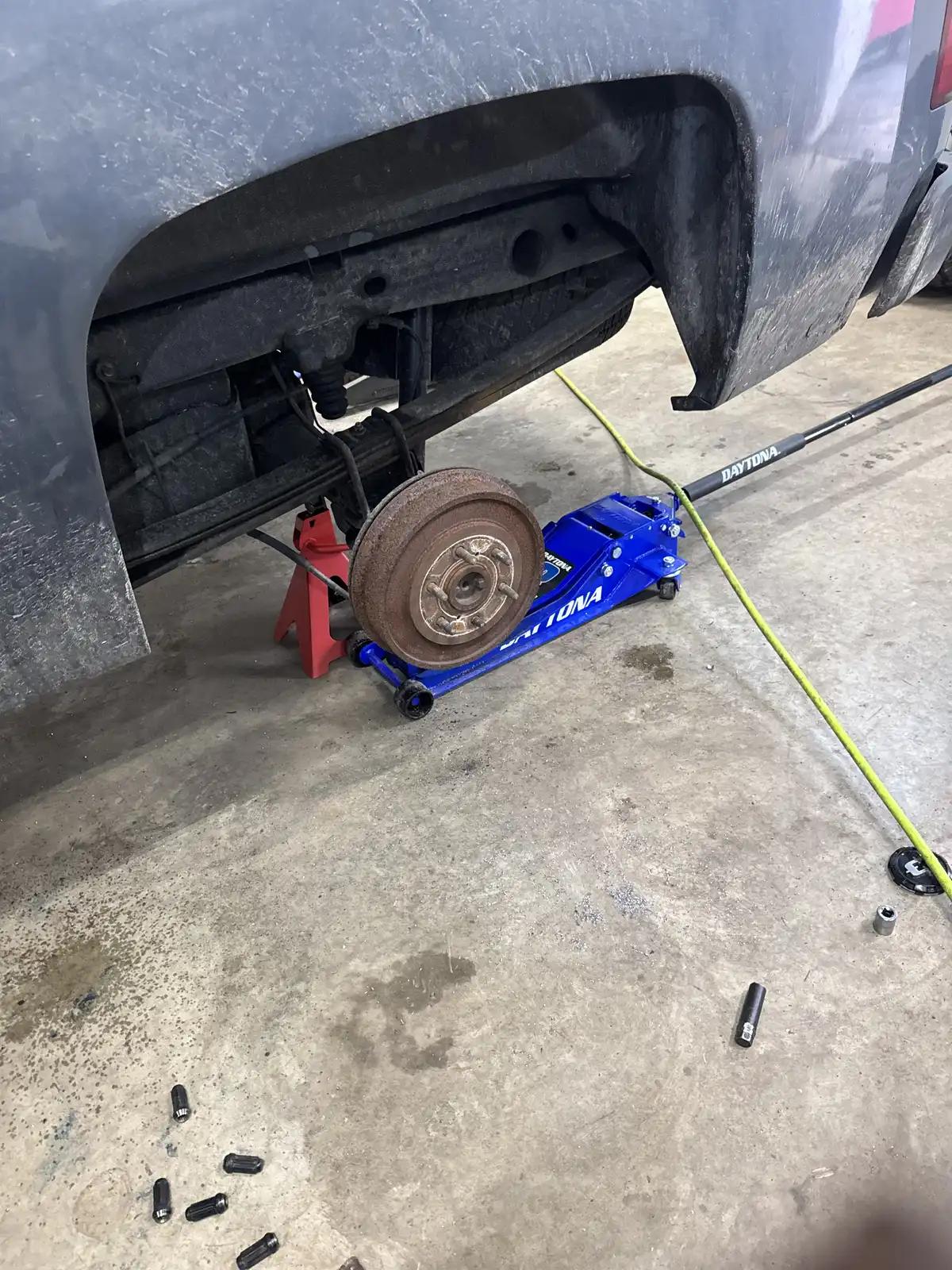 Truck wheel hub service during truck and heavy equipment service