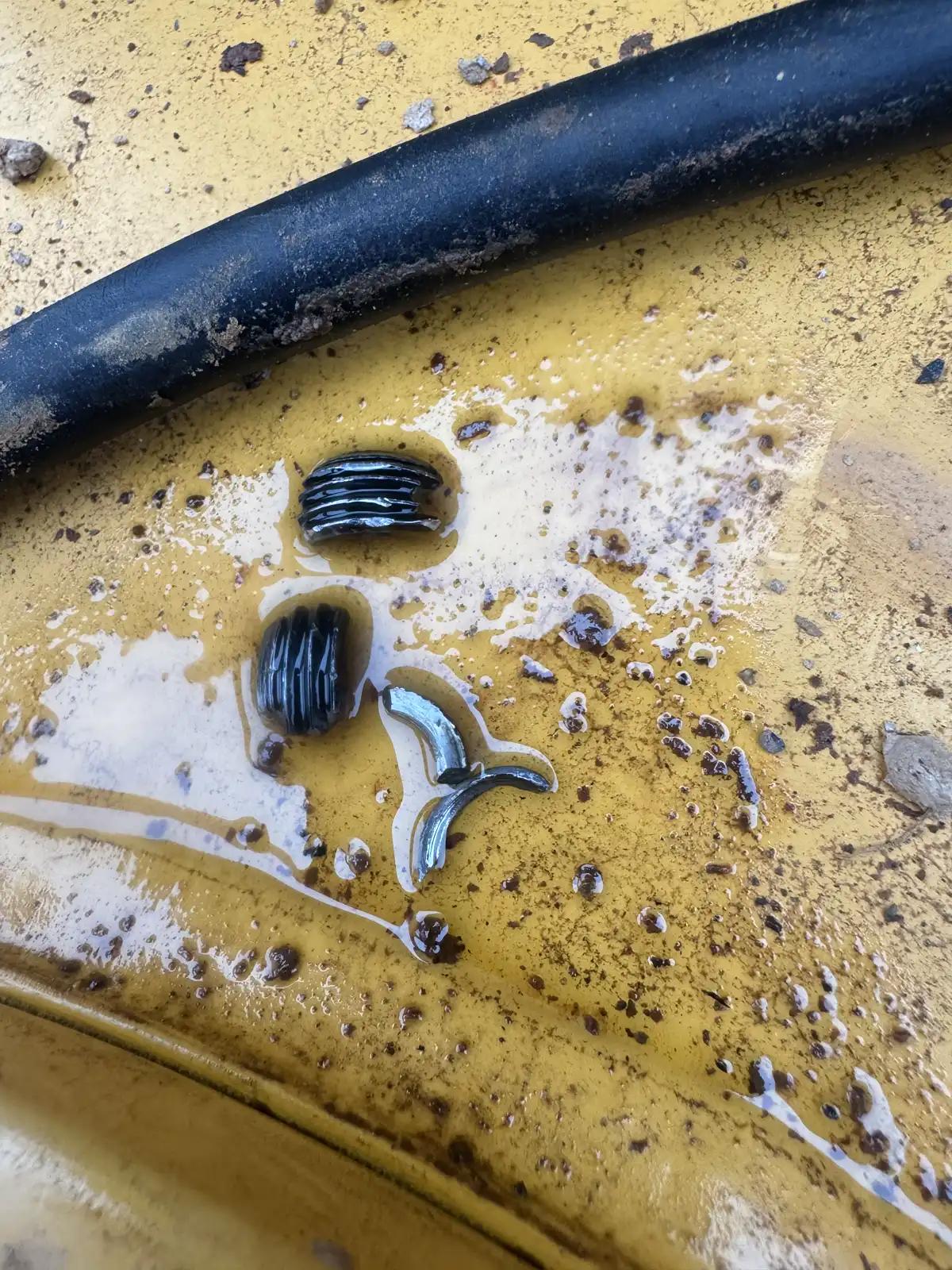 Removed hose and seals during truck and heavy equipment service