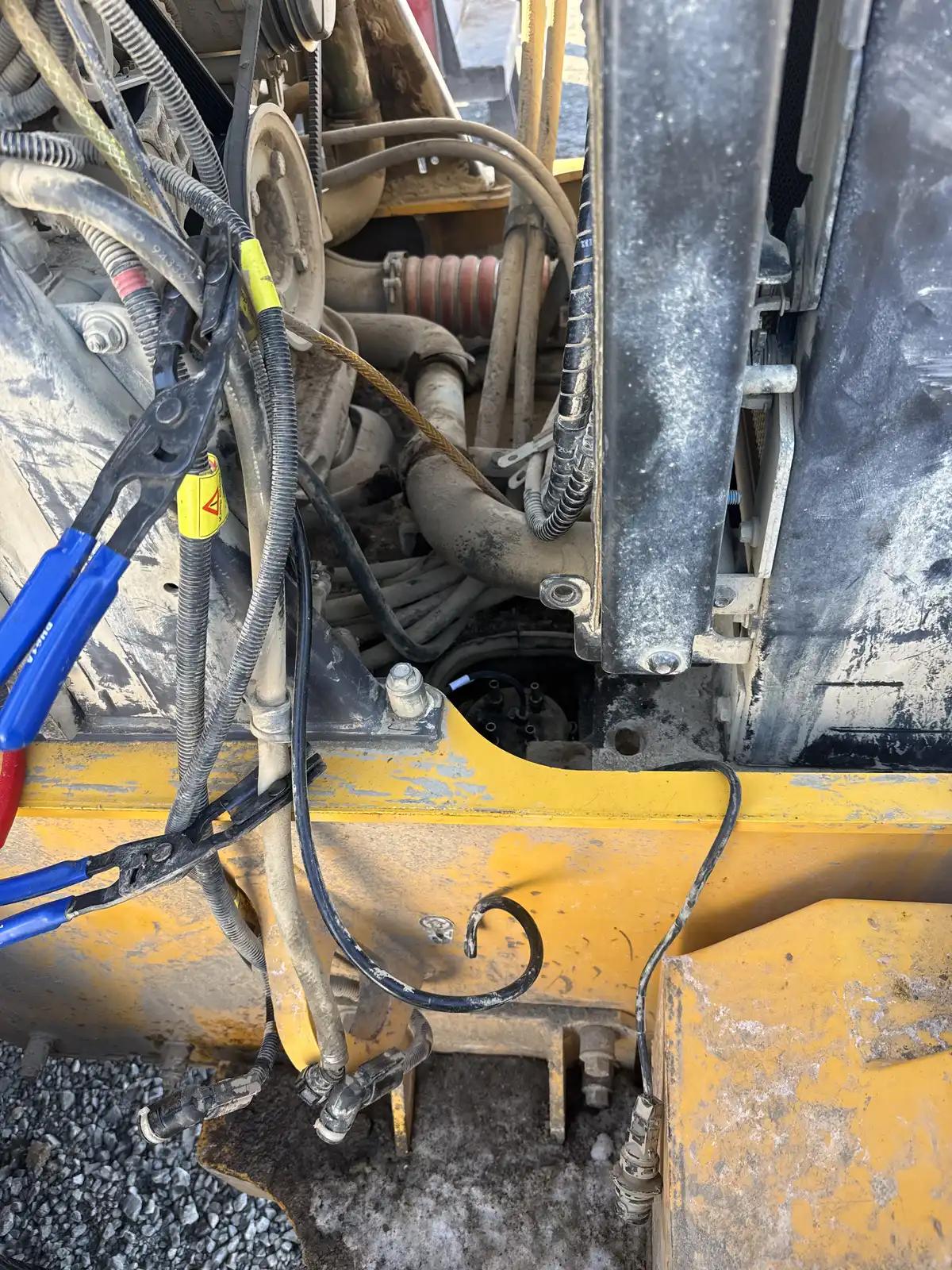 Equipment hoses and engine access during truck and heavy equipment service