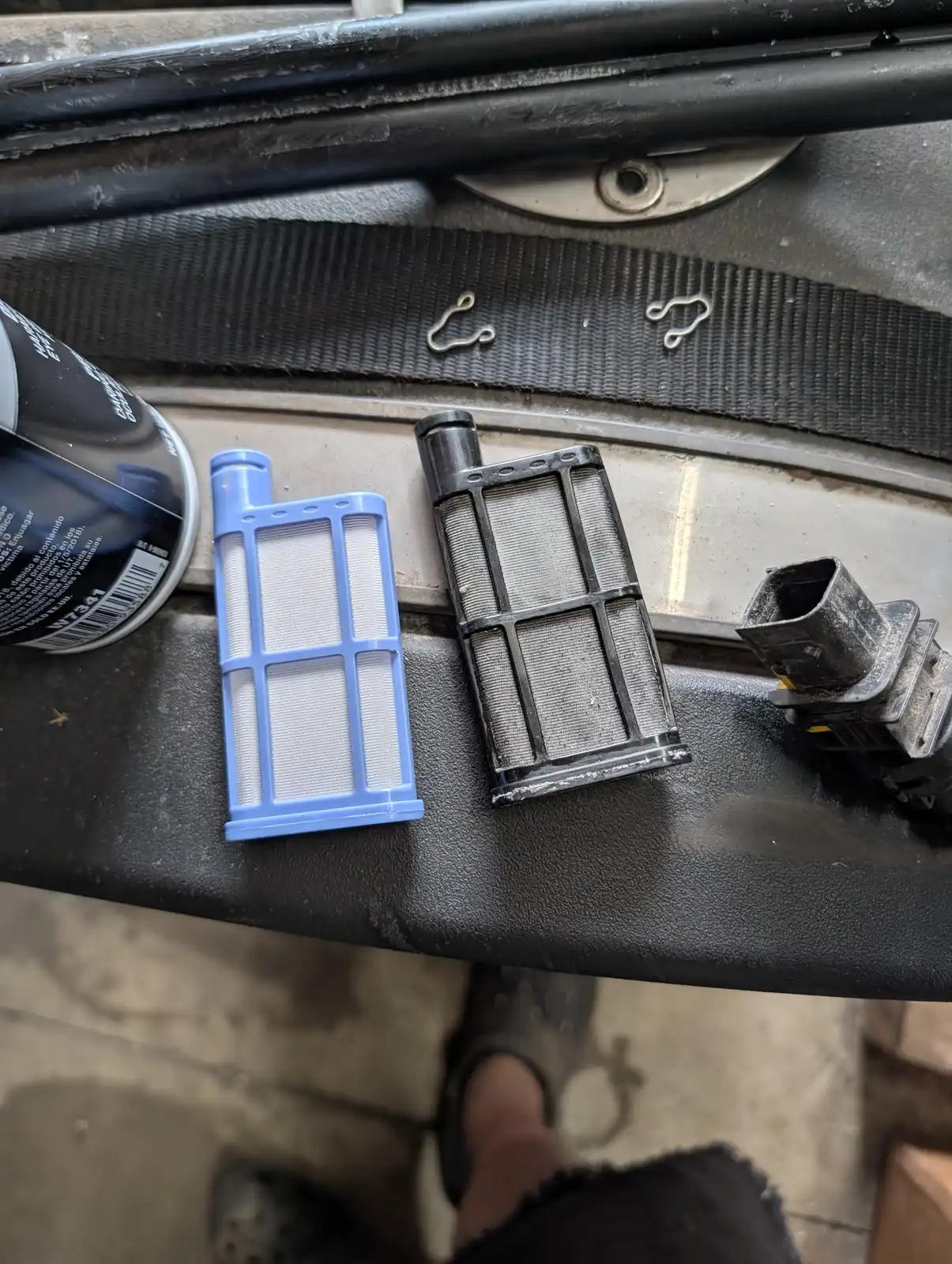 Engine air filter inspection during truck and heavy equipment service