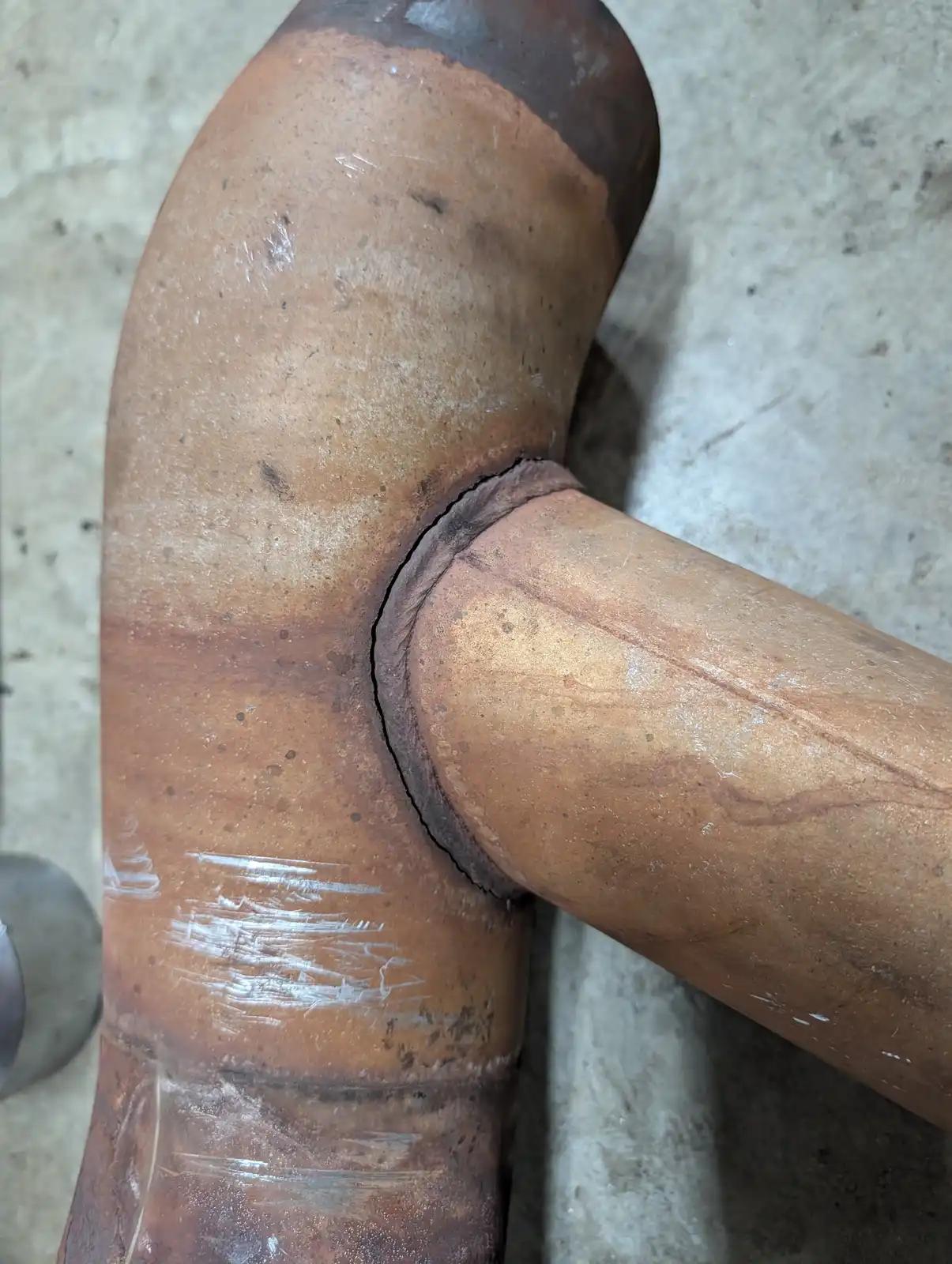 Fabricated pipe connection during truck and heavy equipment service