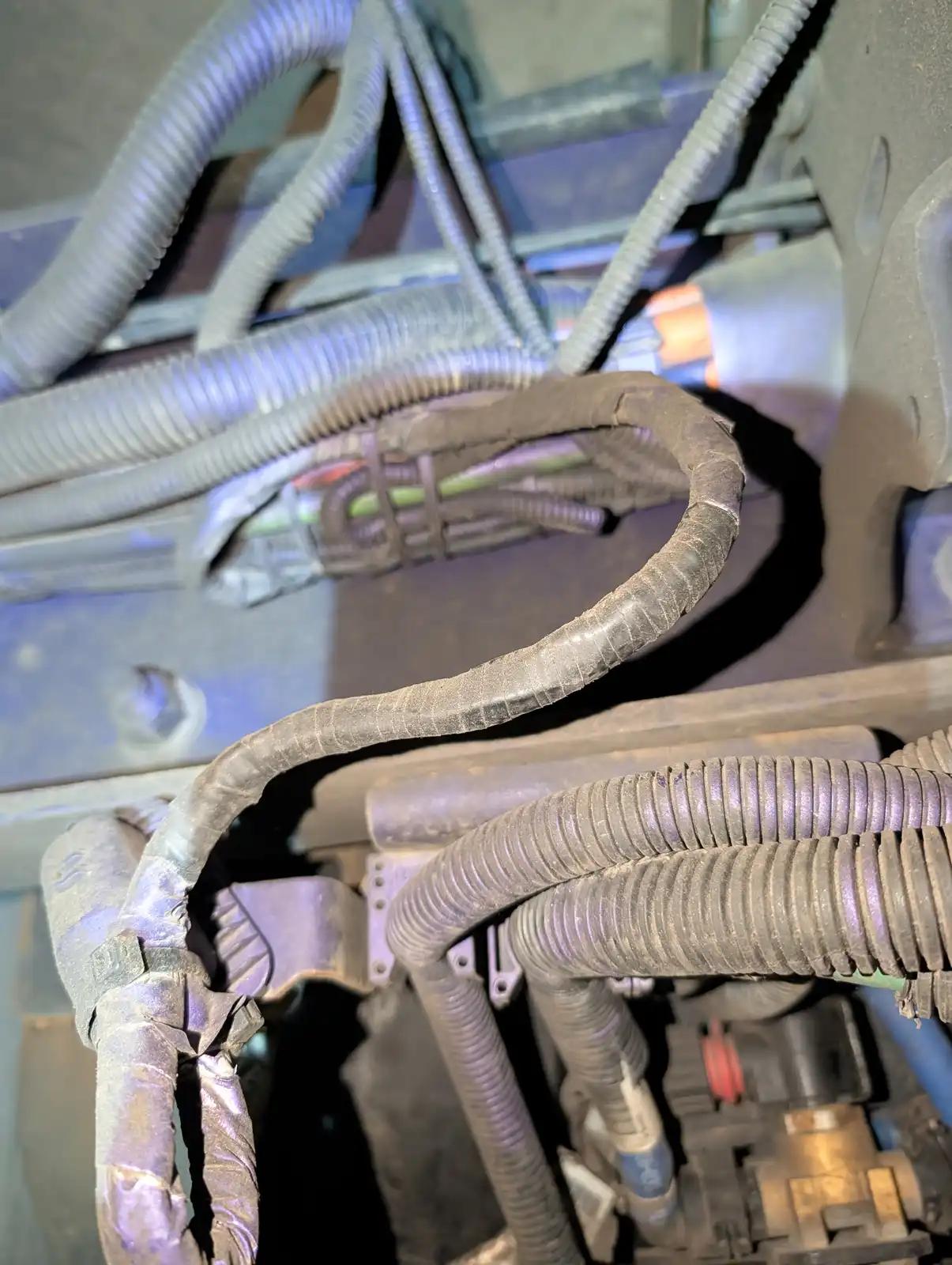 Wiring harness inspection during truck and heavy equipment service