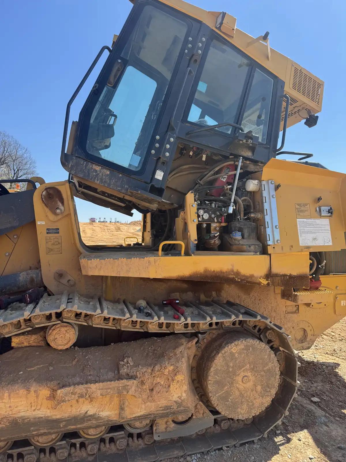 Tracked dozer at the work site during truck and heavy equipment service