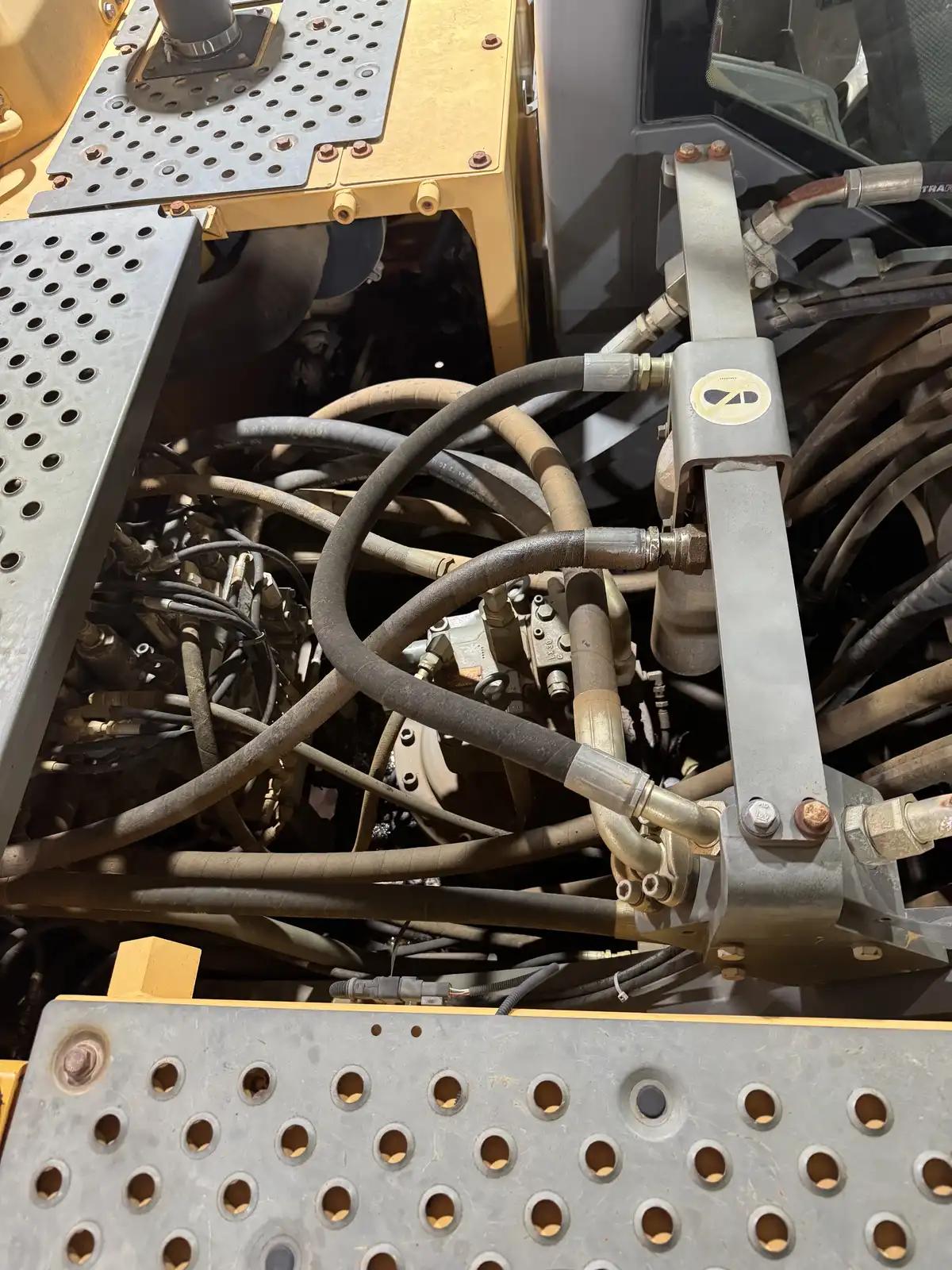 Equipment hydraulic lines during truck and heavy equipment service