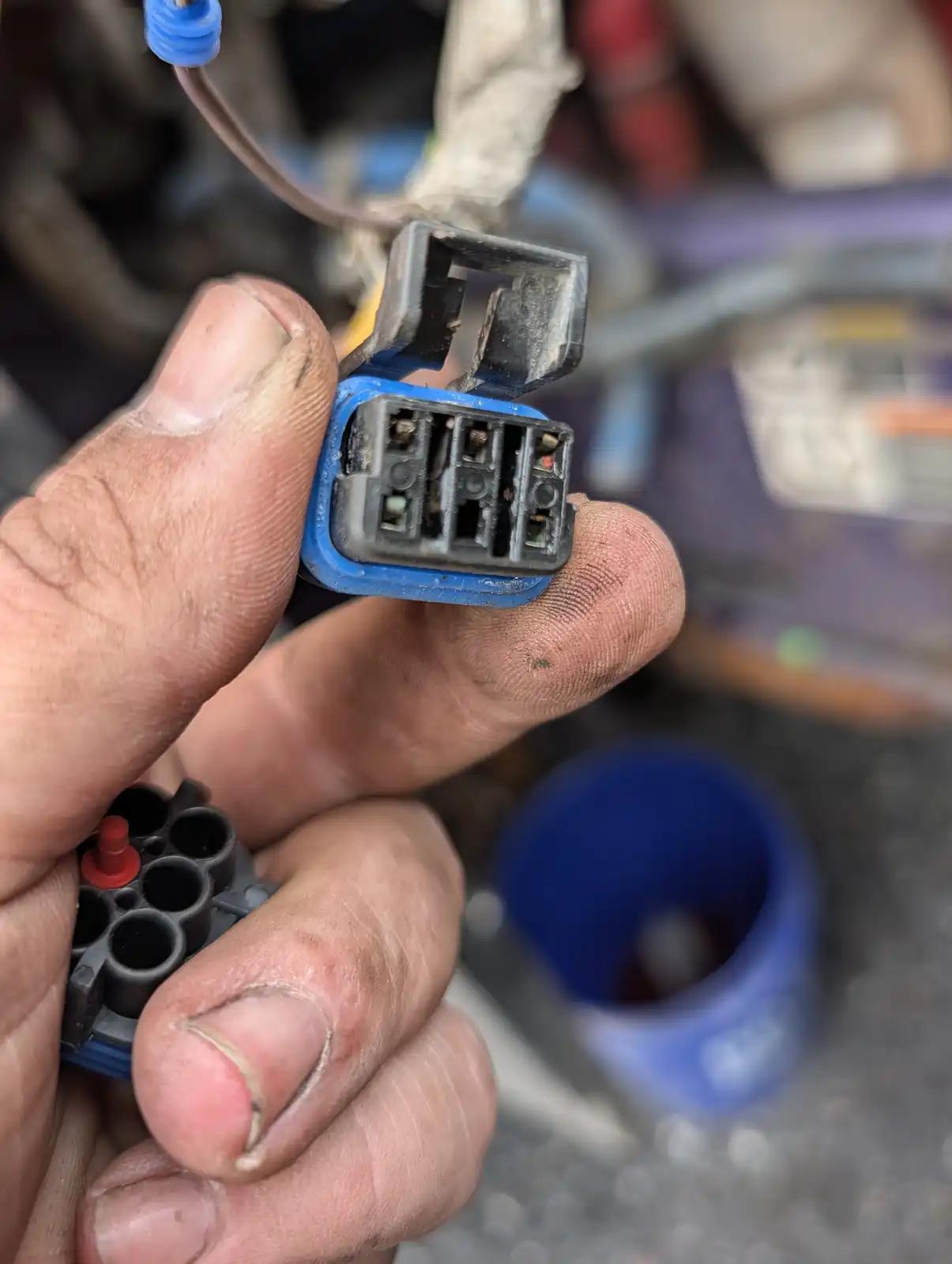Connector pins close-up during truck and heavy equipment service
