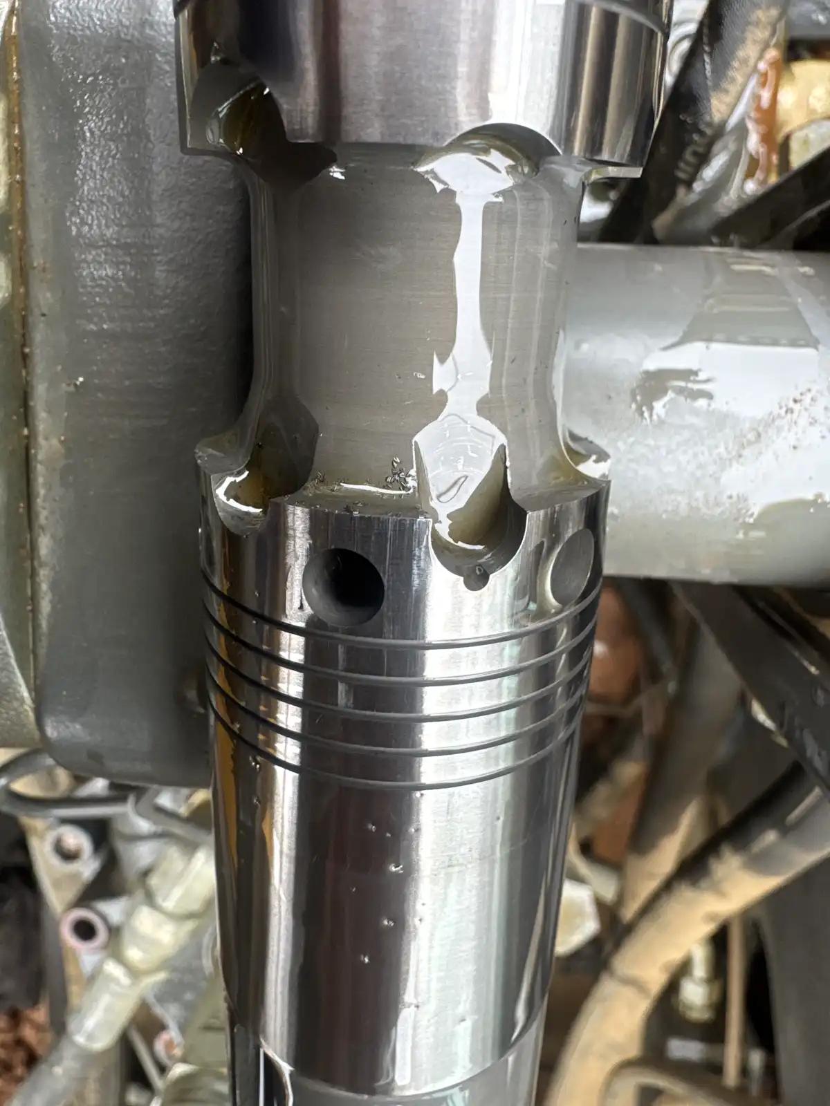 Equipment cylinder component during truck and heavy equipment service