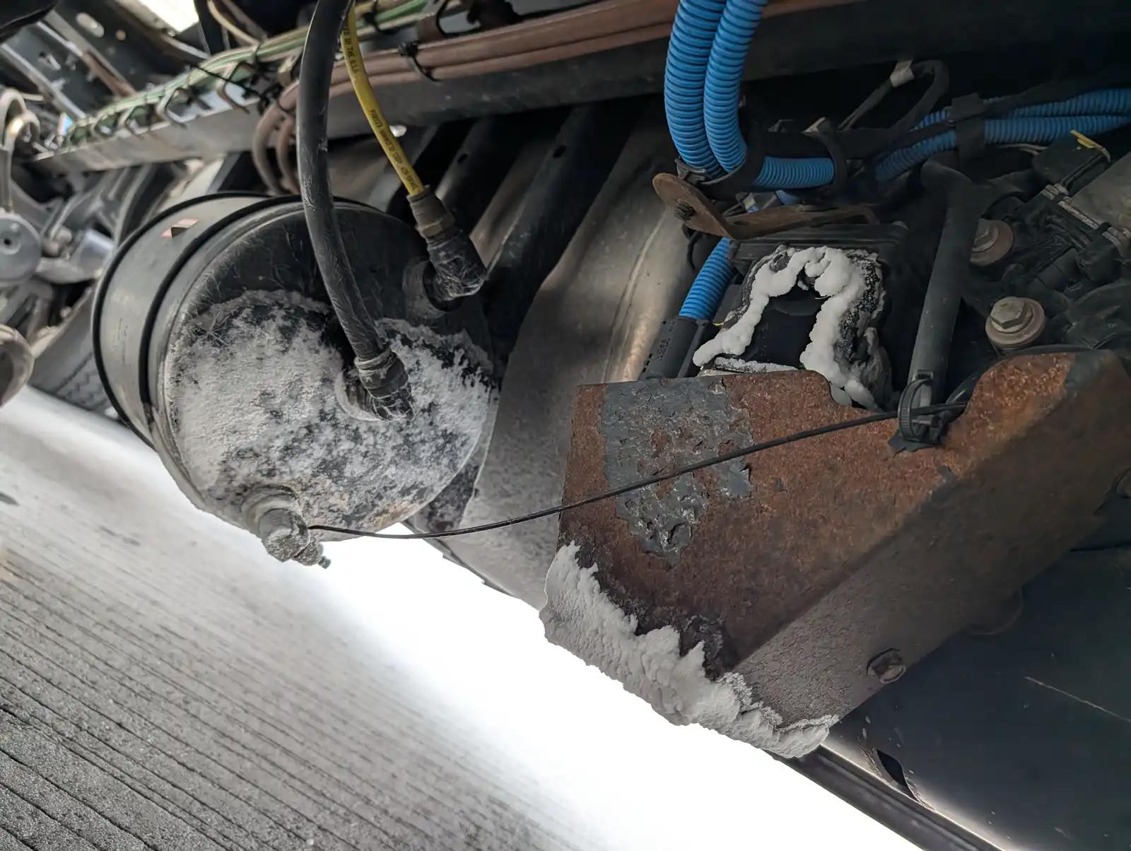 Equipment engine and hoses during truck and heavy equipment service