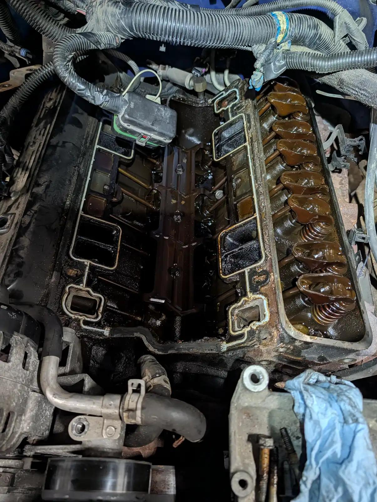 Diesel engine with cover removed during truck and heavy equipment service