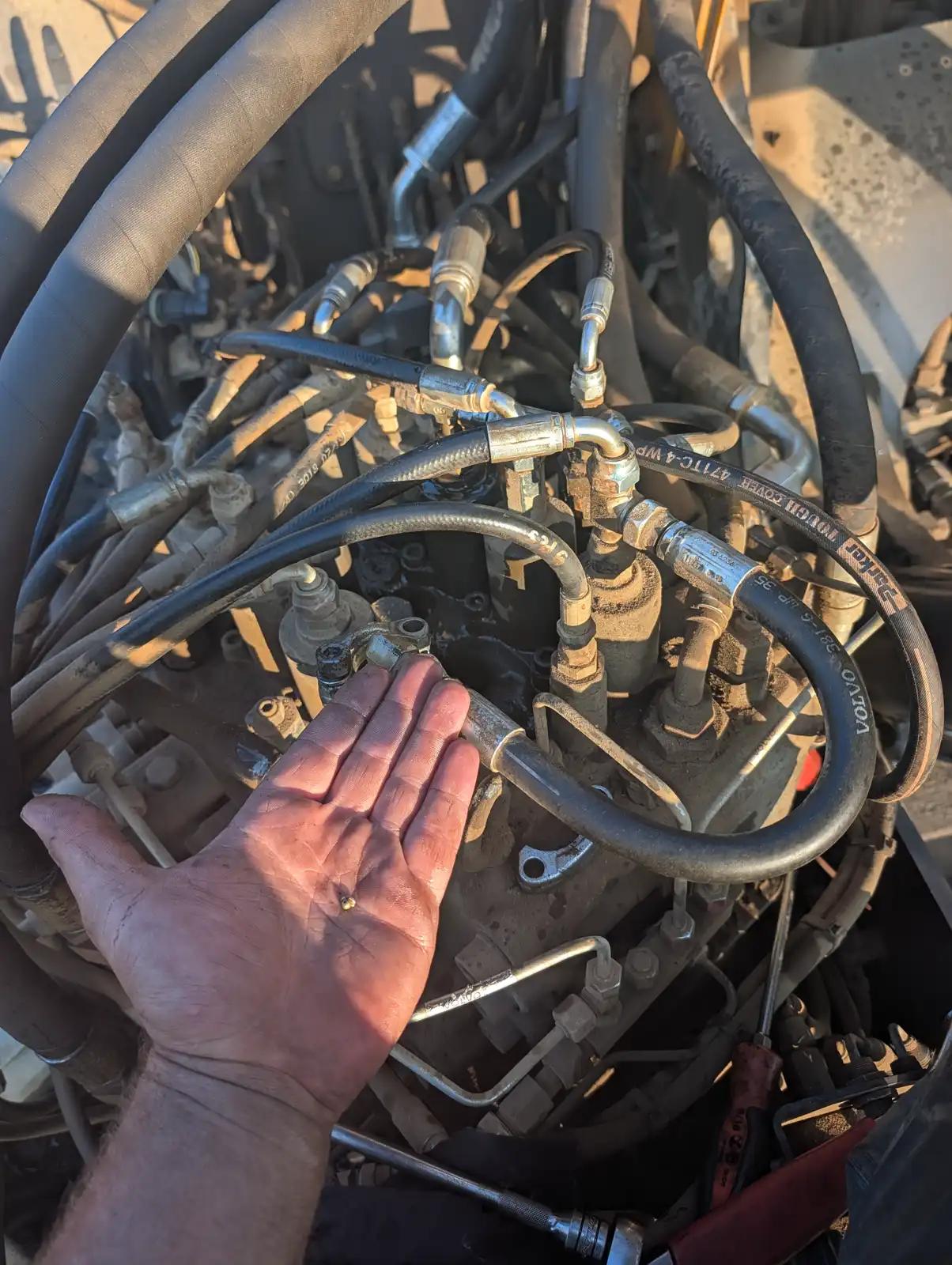 Engine wiring inspection during truck and heavy equipment service