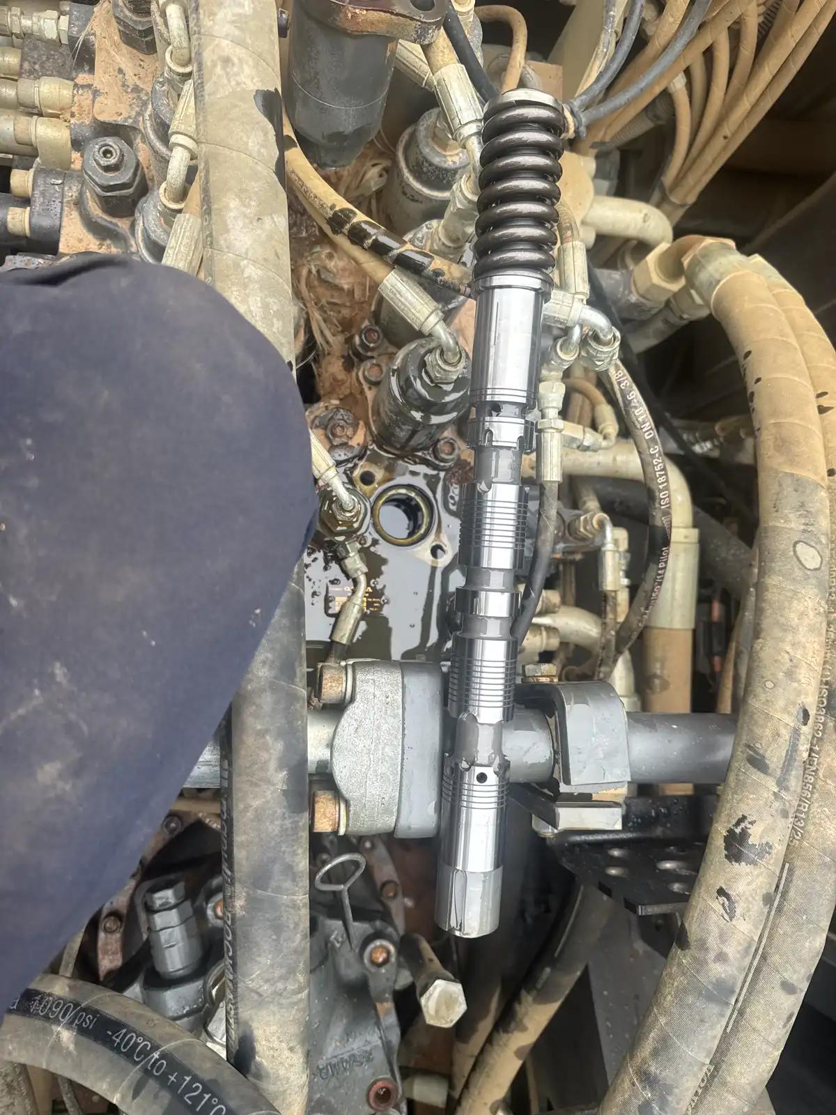Equipment linkage and hoses during truck and heavy equipment service
