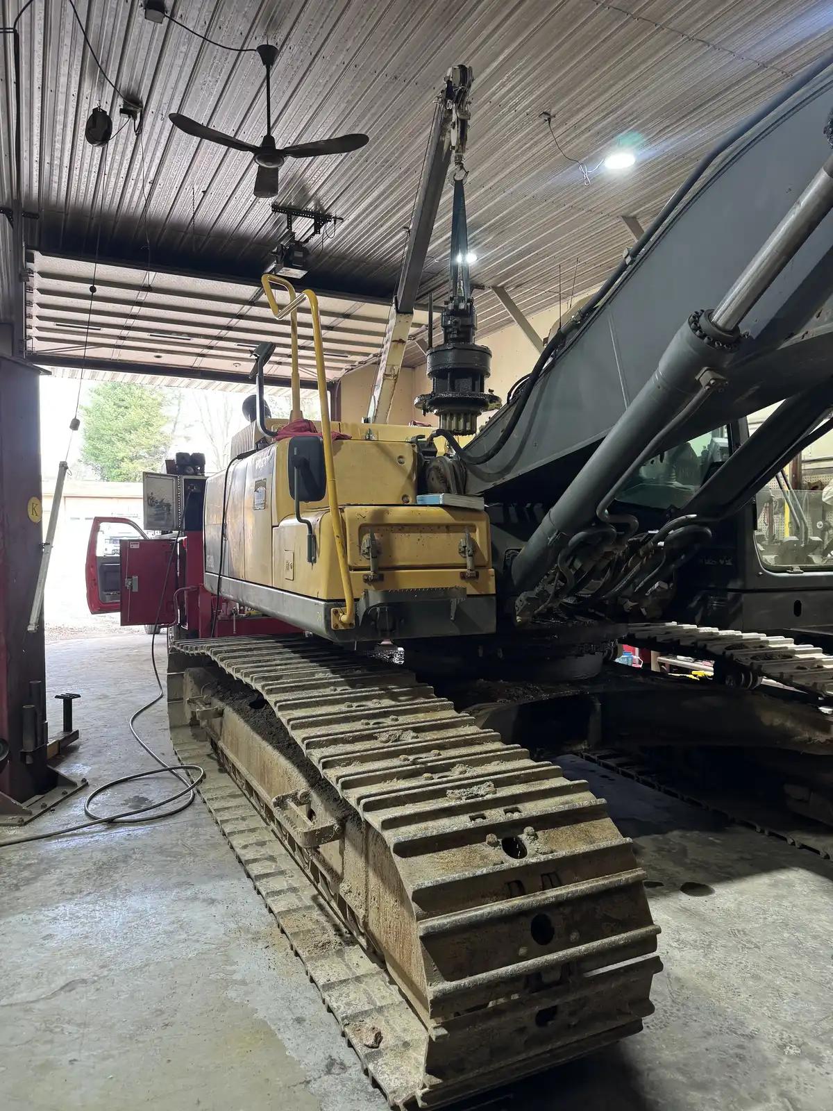 Tracked equipment in the workshop during truck and heavy equipment service