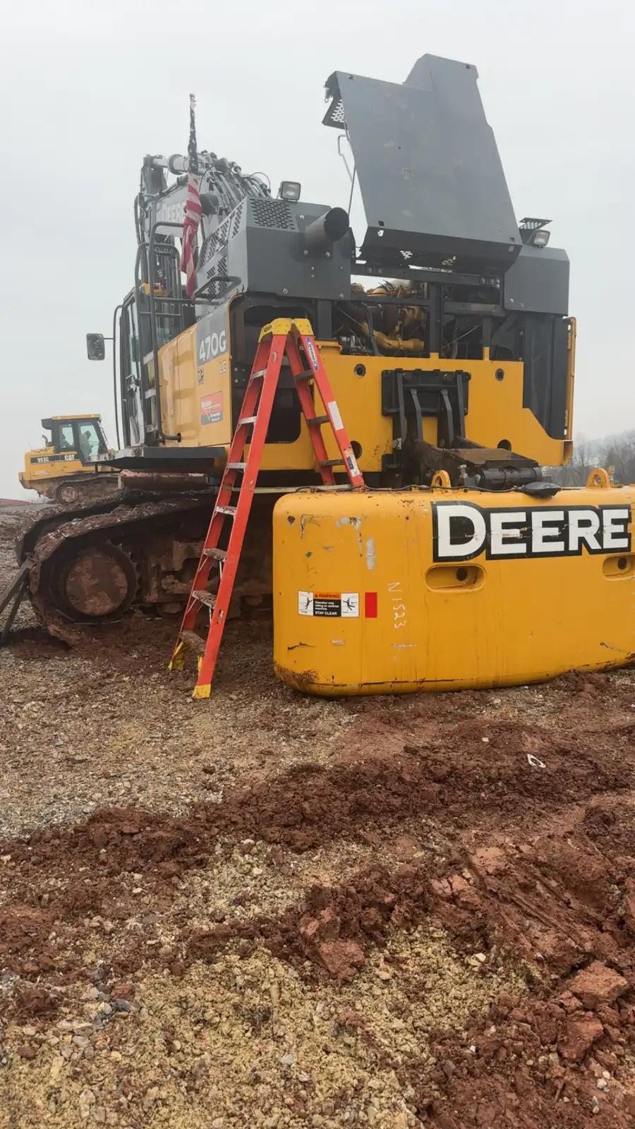 John Deere tracked equipment during truck and heavy equipment service