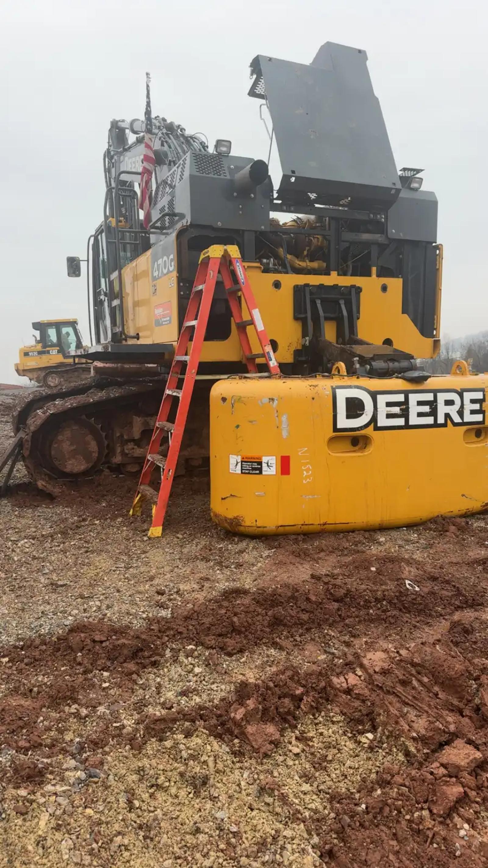 John Deere tracked equipment during truck and heavy equipment service