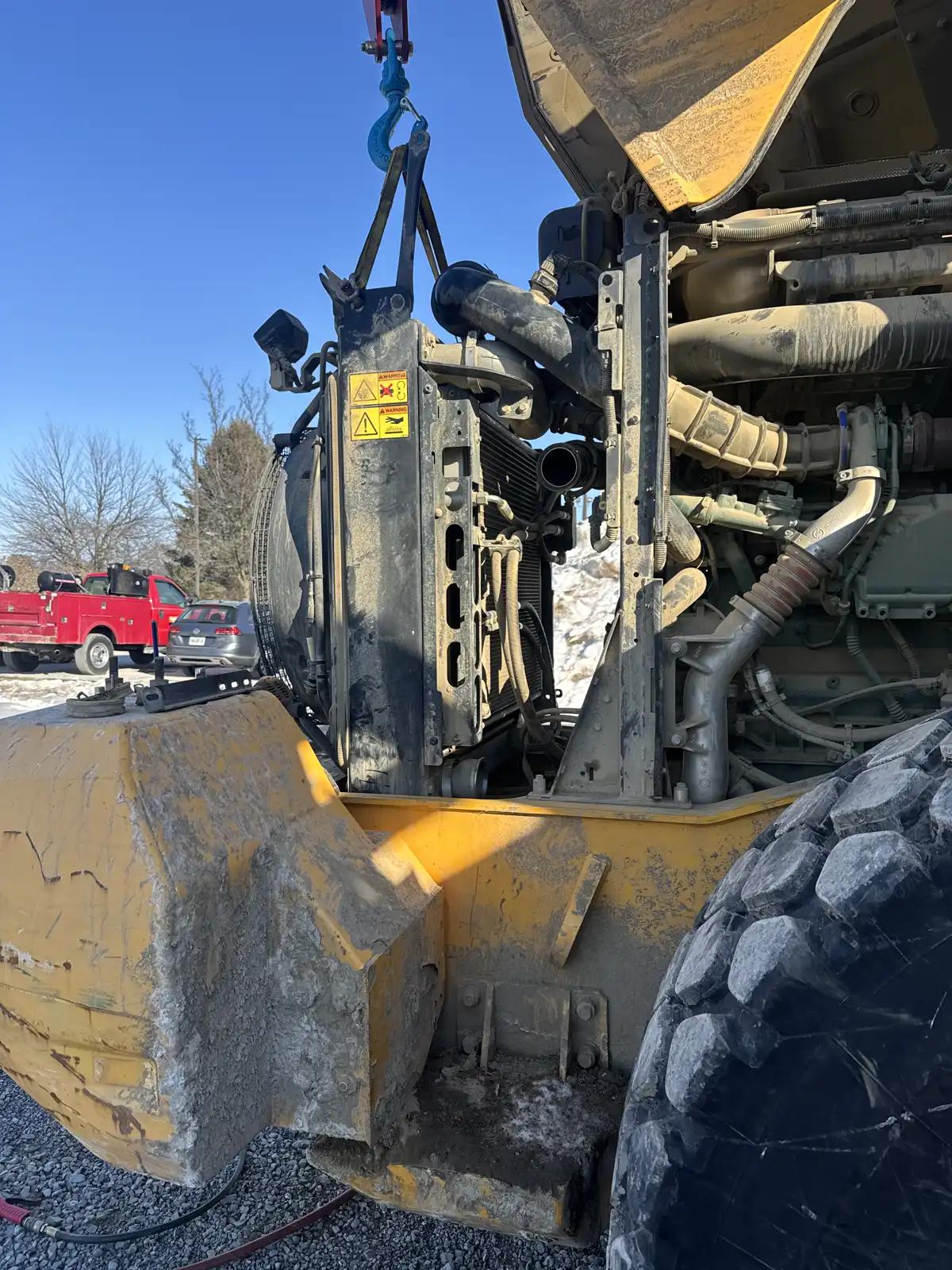 Heavy equipment engine access during truck and heavy equipment service