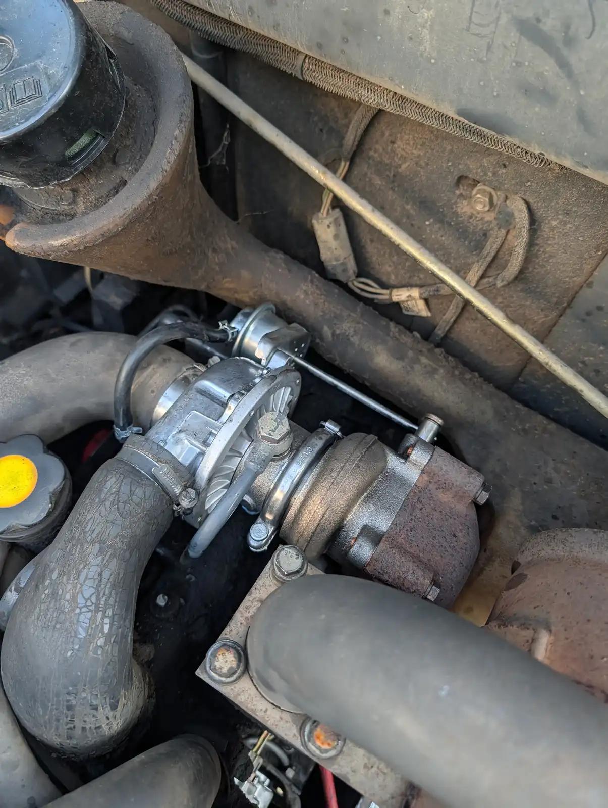 Engine hose access during truck and heavy equipment service