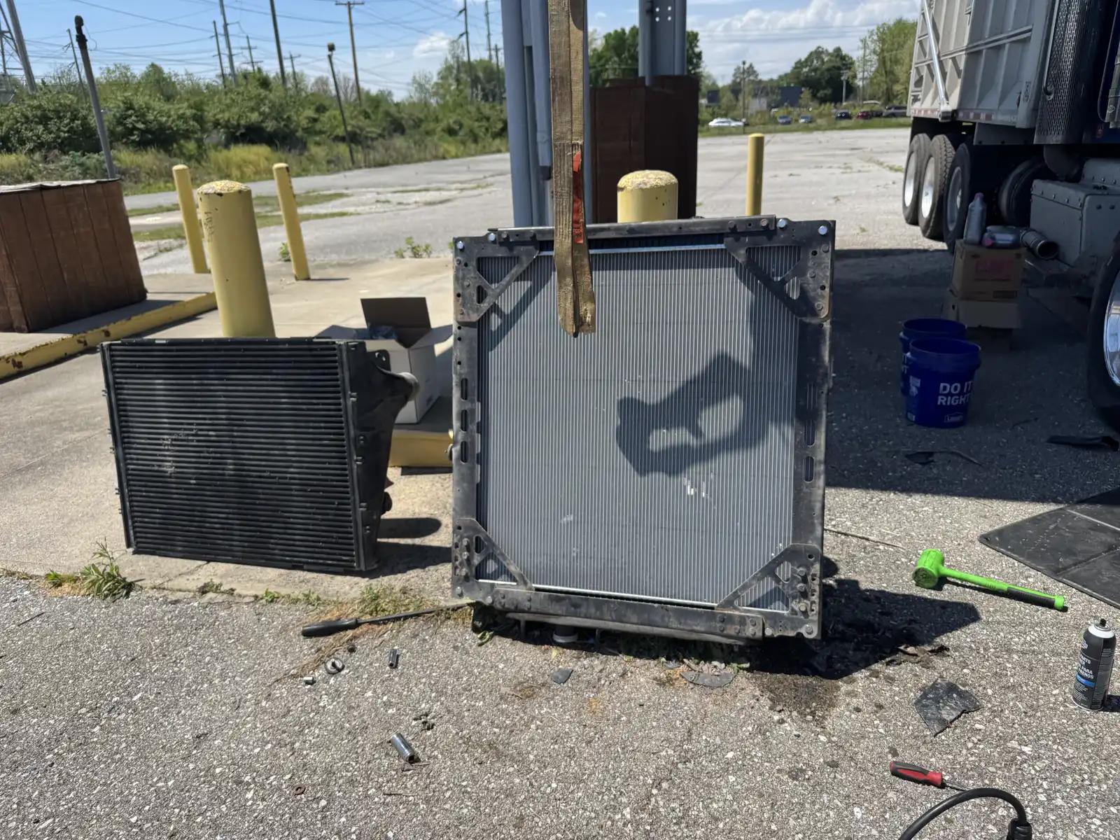 Cooling assembly beside the truck during truck and heavy equipment service