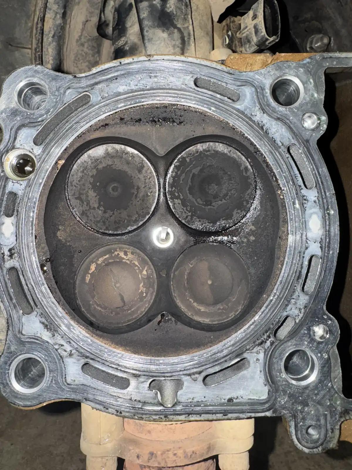 Engine cylinder head during truck and heavy equipment service