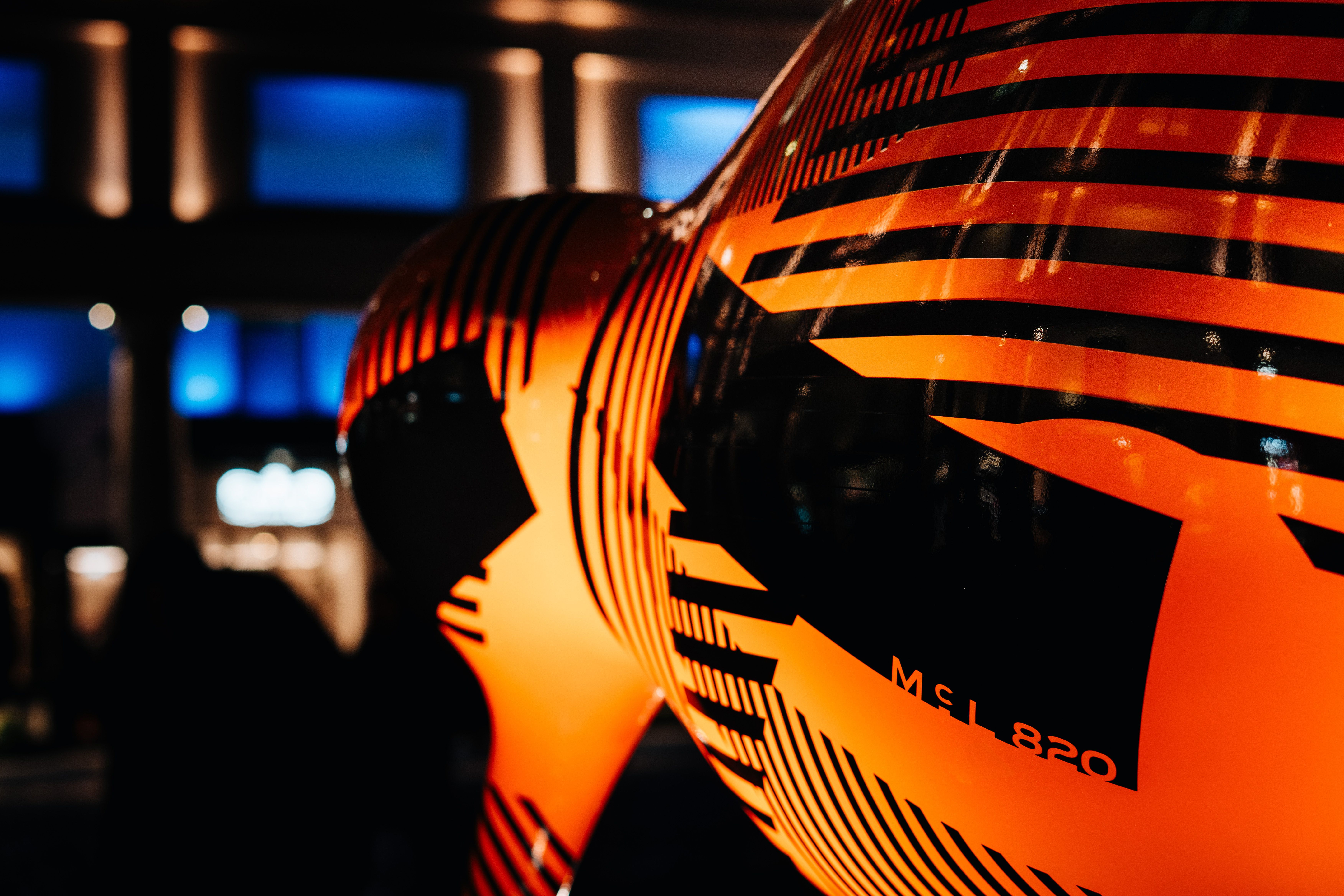 Close-up of McL 820 camouflage on the McLaren kiwi statue