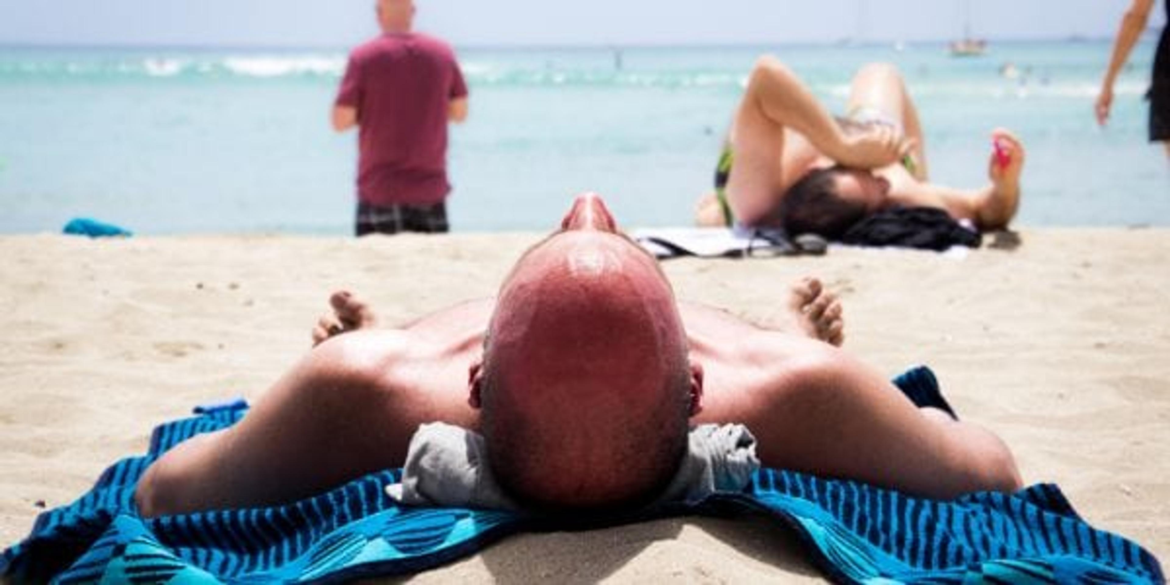 Tanning on a beach