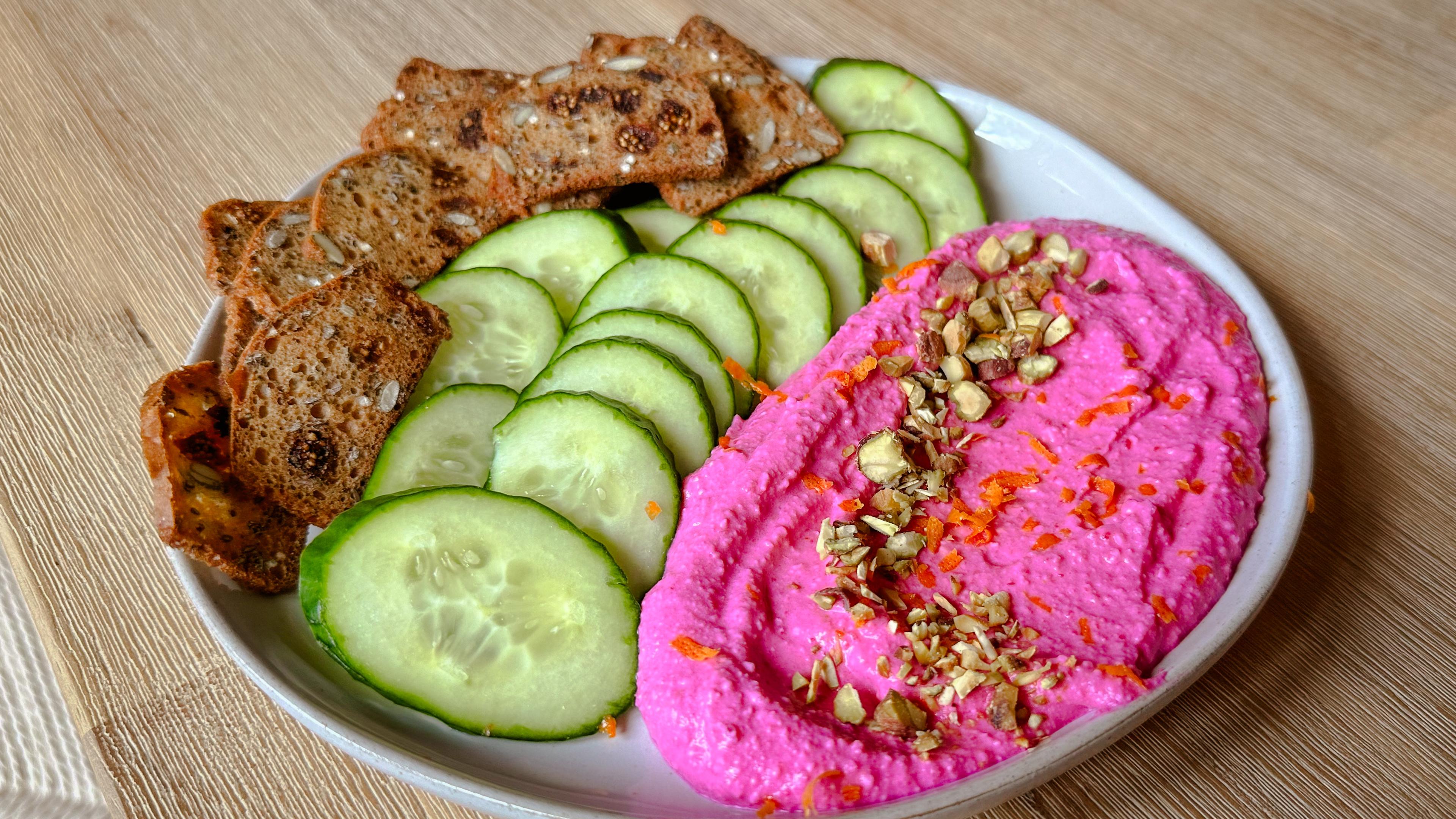 Serve on a platter with seasonal cut vegetables and crackers. Top the beet whipped feta with orange zest and chopped pistachios.