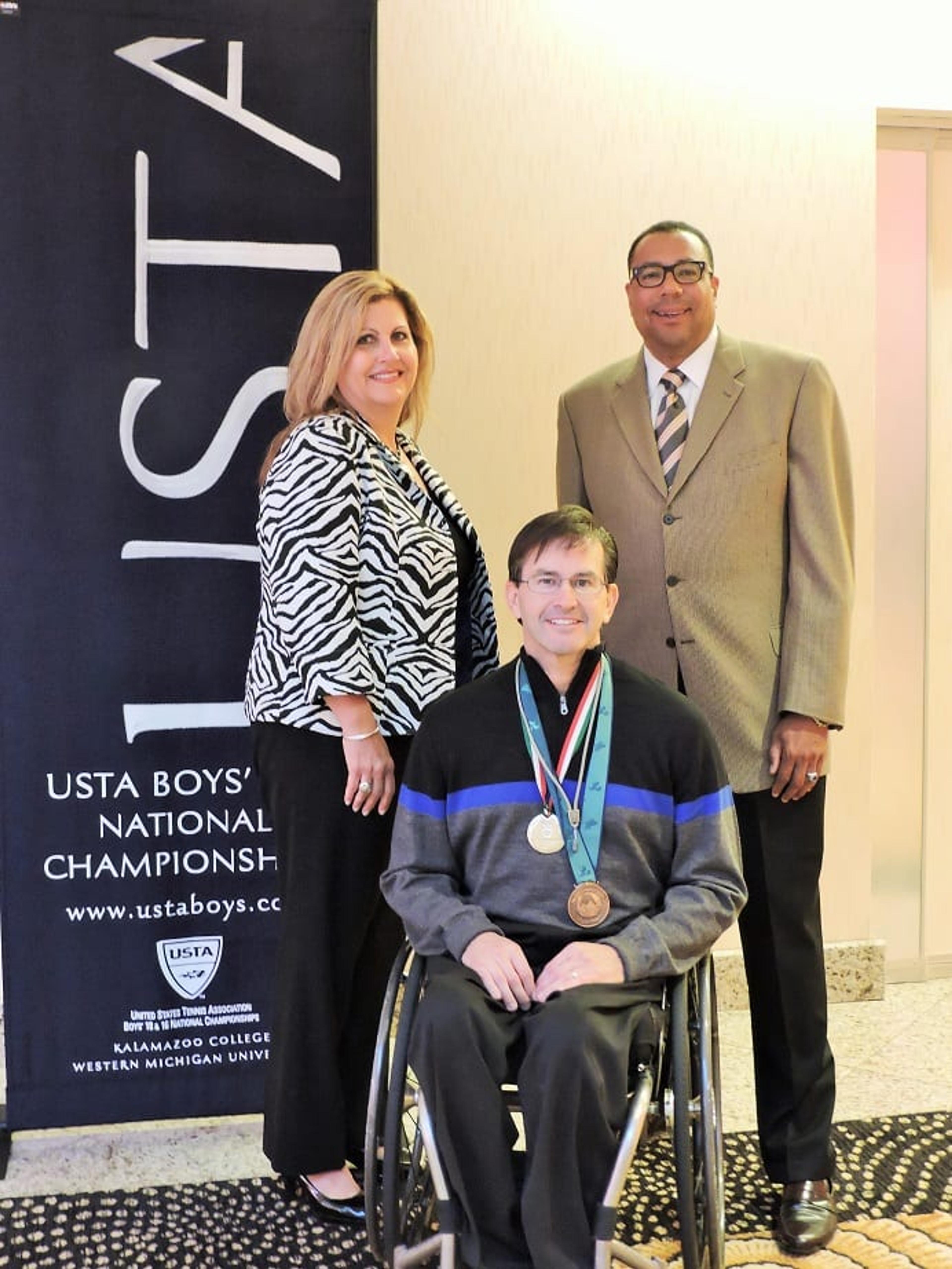 Former Olympian Mike Schlappi is joined by Sophia Quinn, Blue Cross Blue Shield of Michigan Sales Manager, and Mark Riley, USTA Tournament Director.