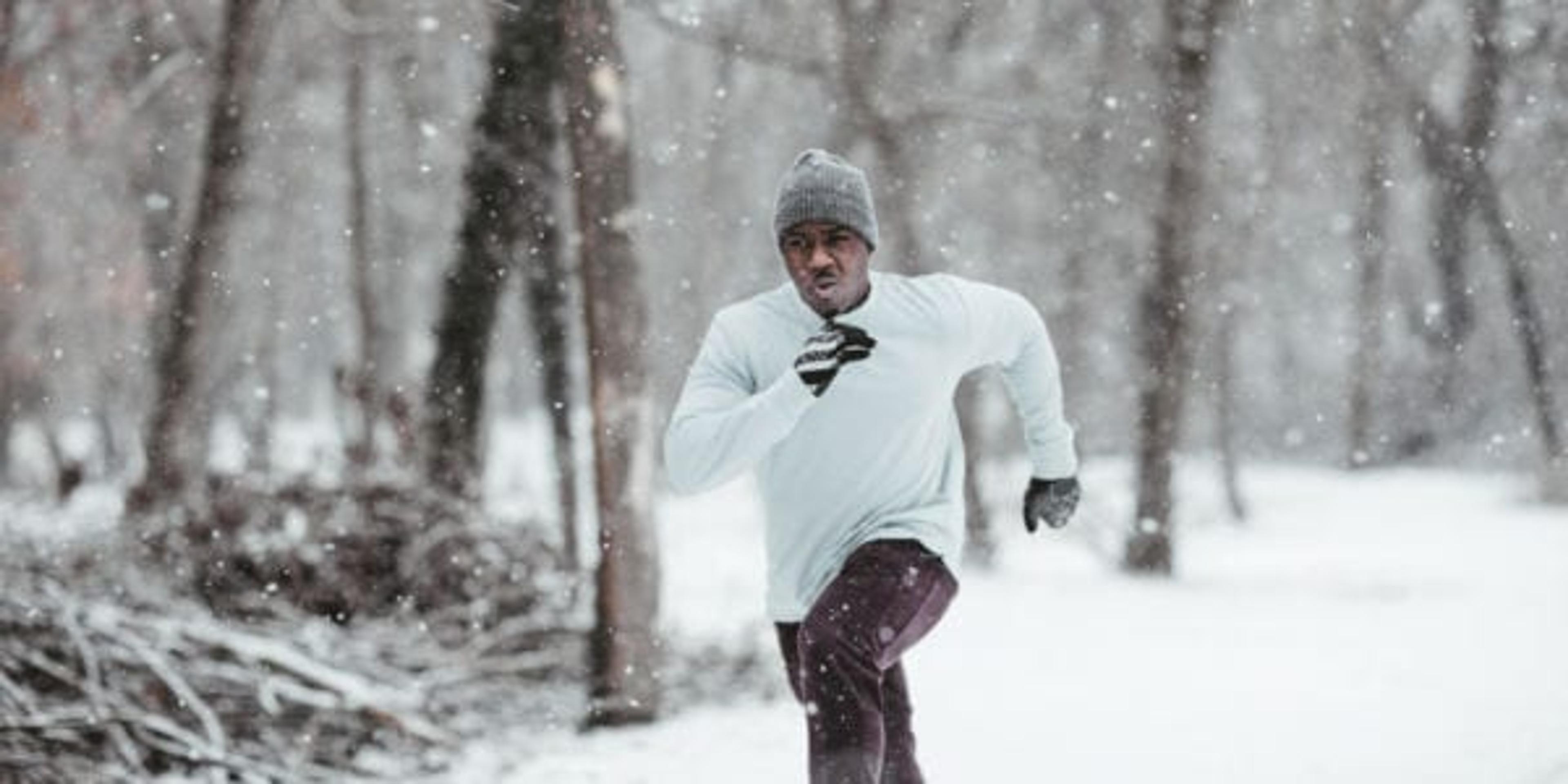 Man running through the snow.