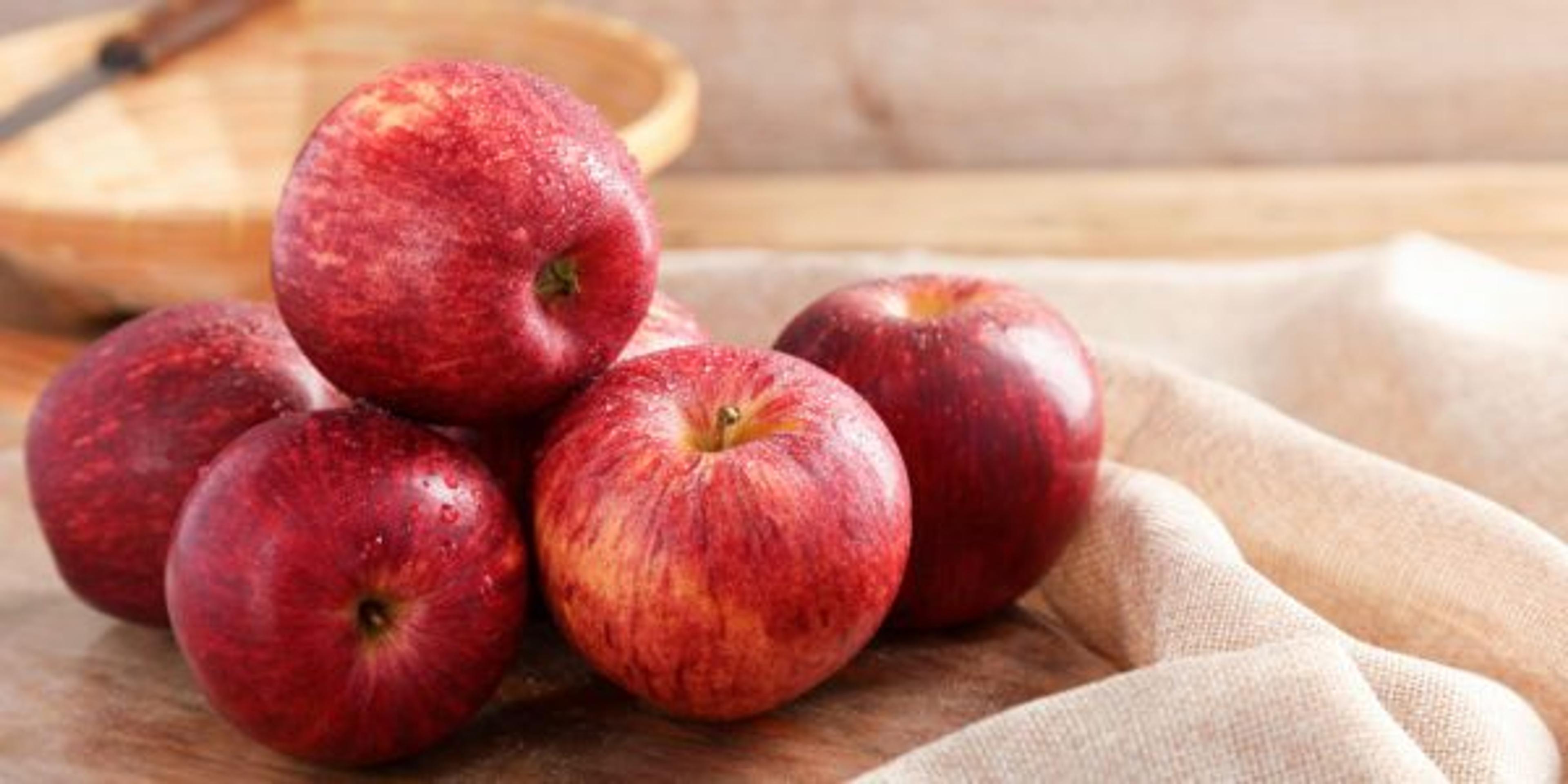 Group of Gala Apple on wooden board background, Fruits concept.