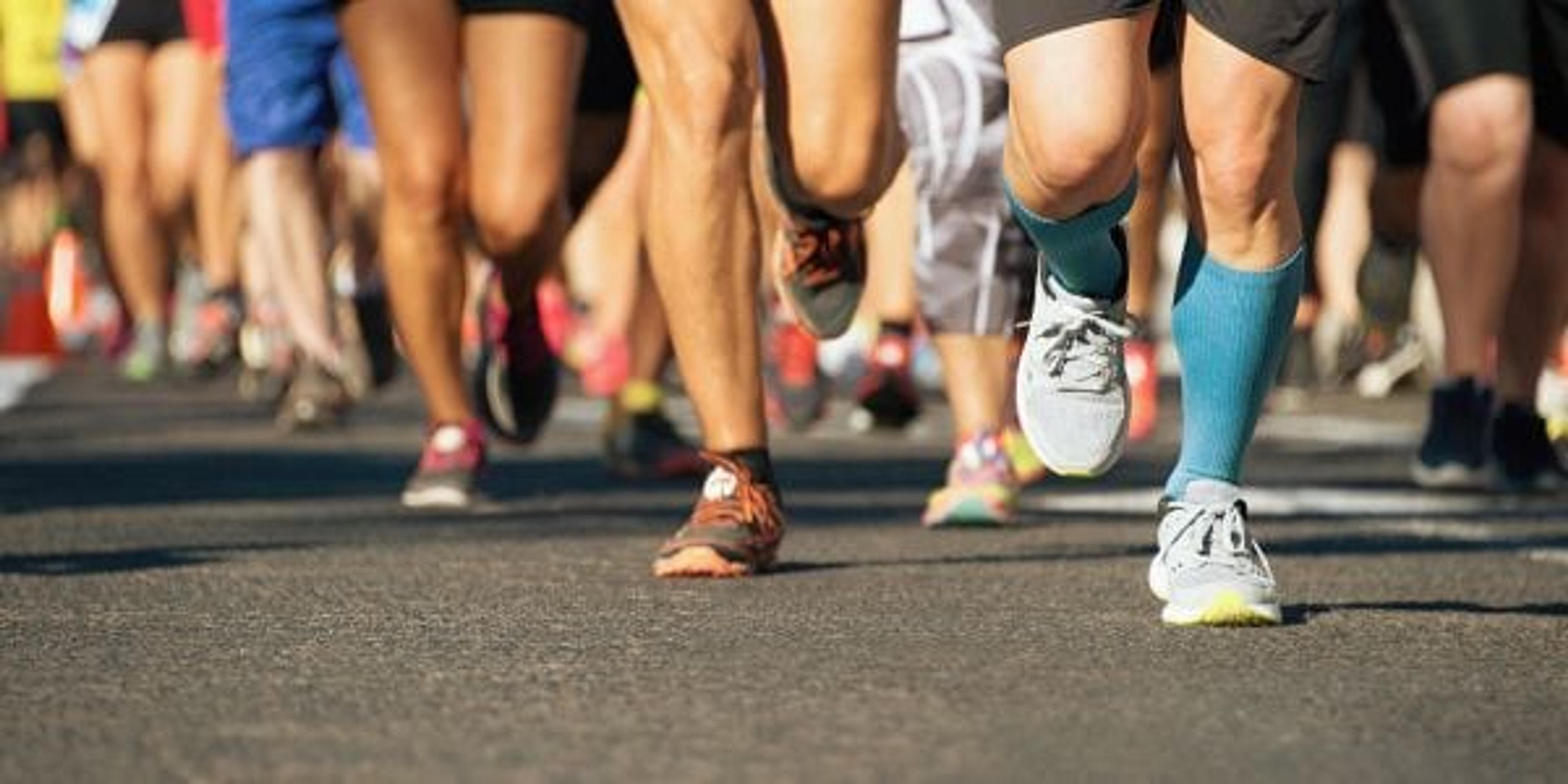 Marathon running race in the light of evening