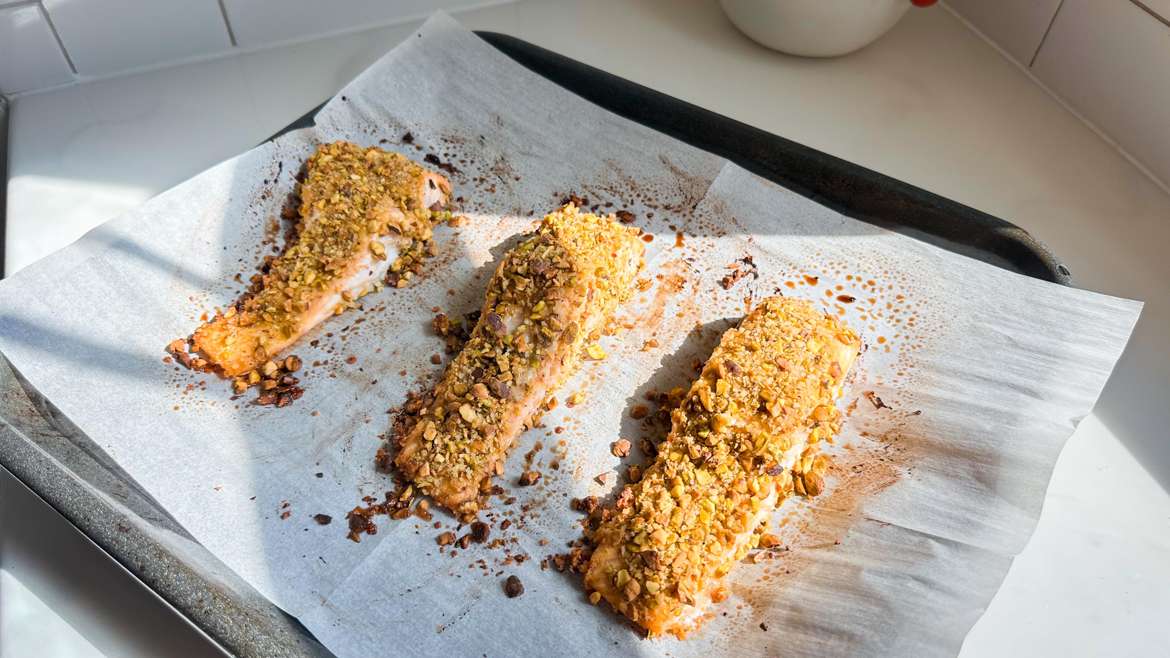 Spray the coated salmon filets with olive oil, then bake for 12-16 minutes, or until desired internal temperature. I usually like 125 degrees F. Thicker salmon filets need to cook toward the longer end of the range. When salmon is cooked, move to a plate and allow to rest on the counter.