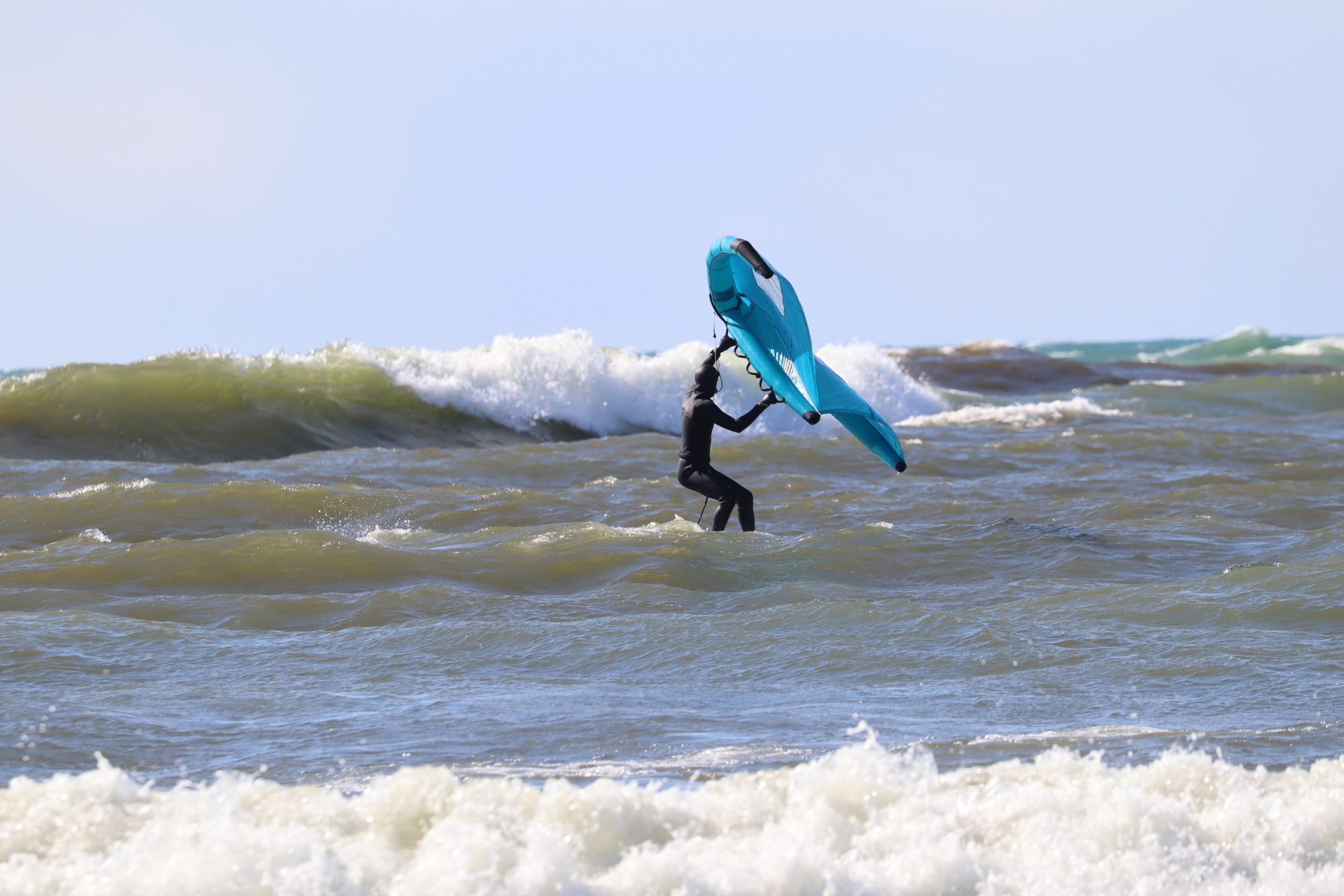 One of the major appeals of wing foiling is it can be fun to do even if the waves aren’t high and the wind isn’t overbearing, because of its versatility. The board and wing do some of the work for you.