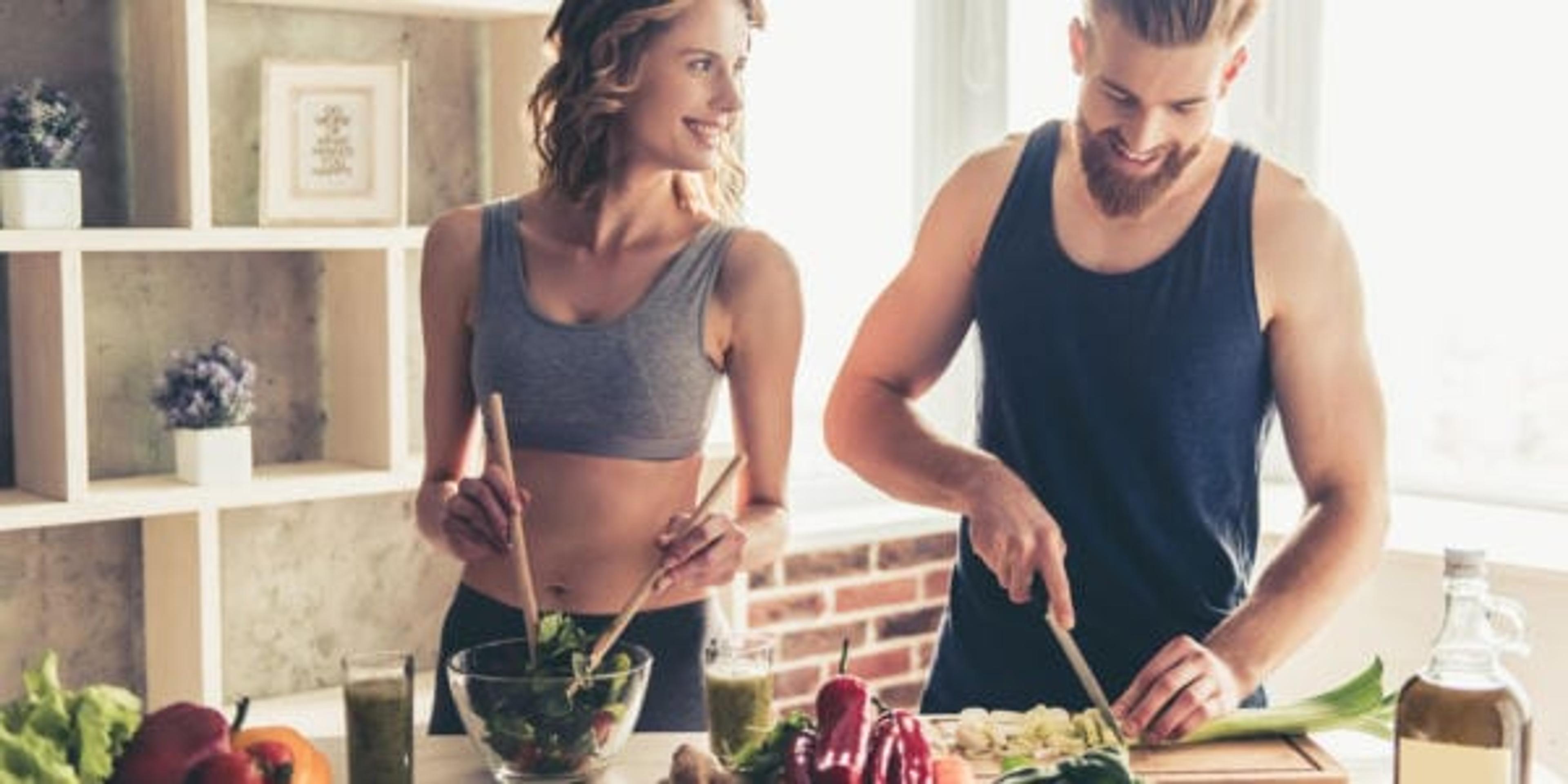 Couple cooking healthy food