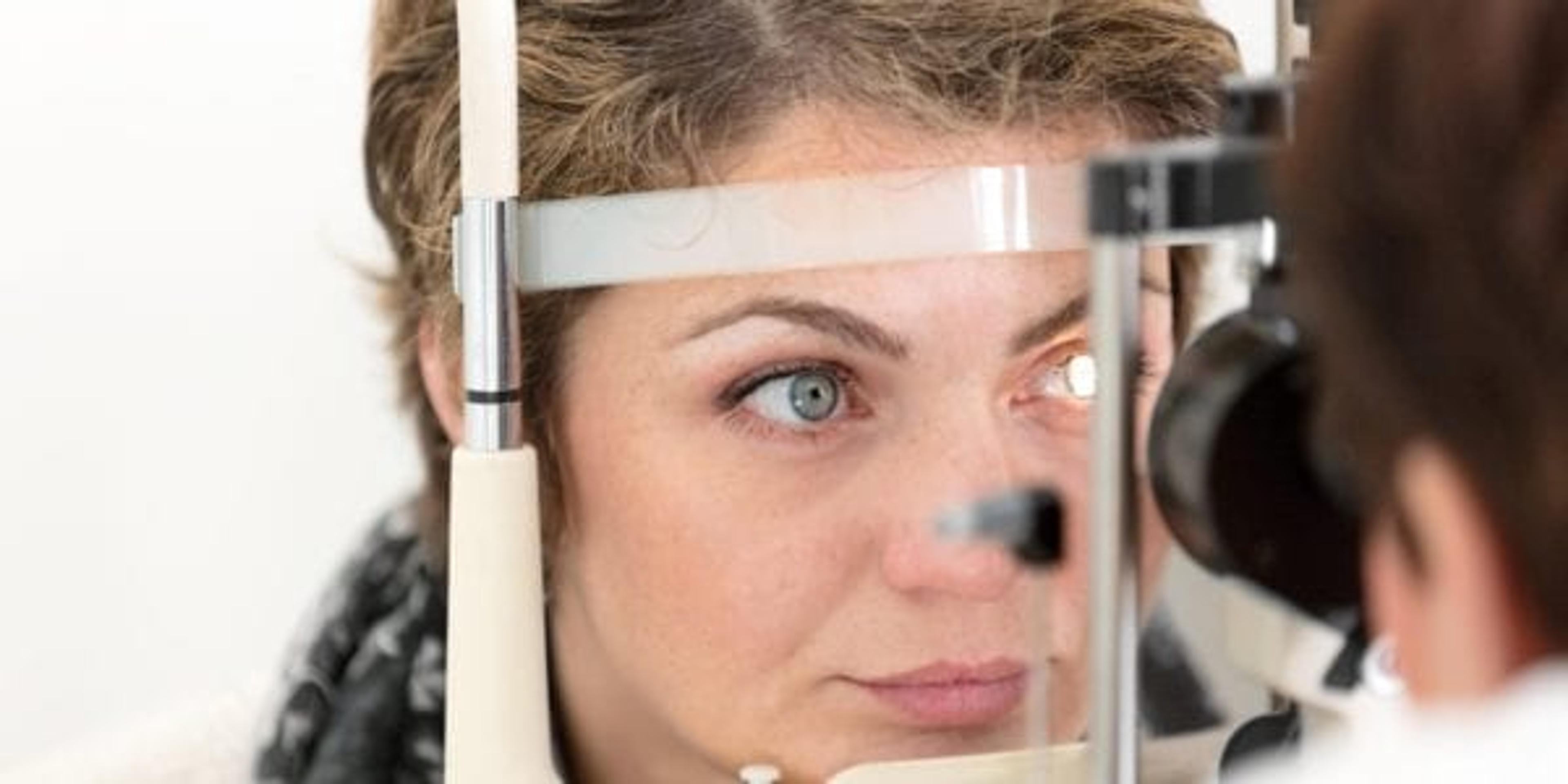 Woman getting an eye exam