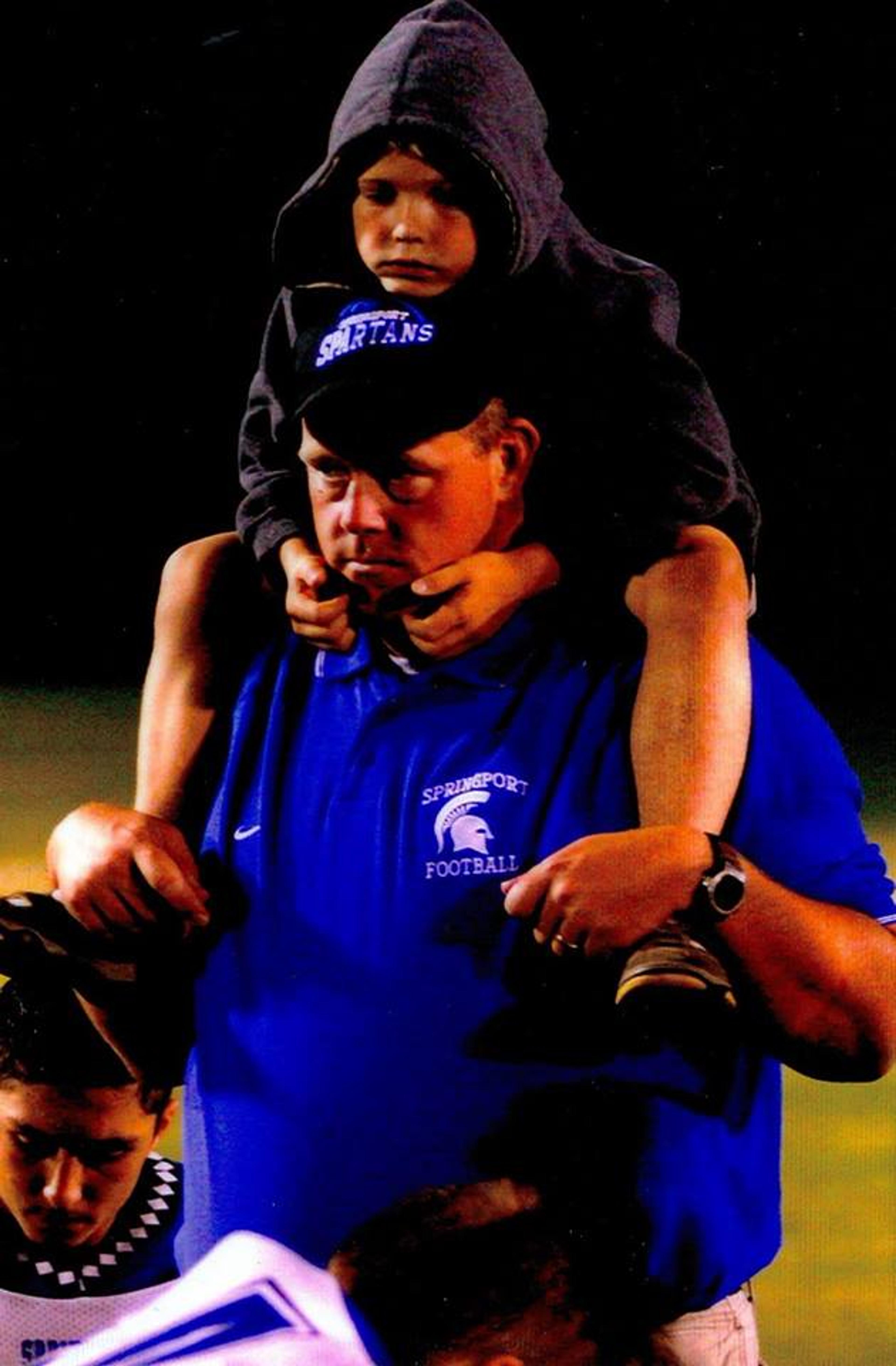 Todd Overweg coaching with son Luke. Photo courtesy of the Overweg family.
