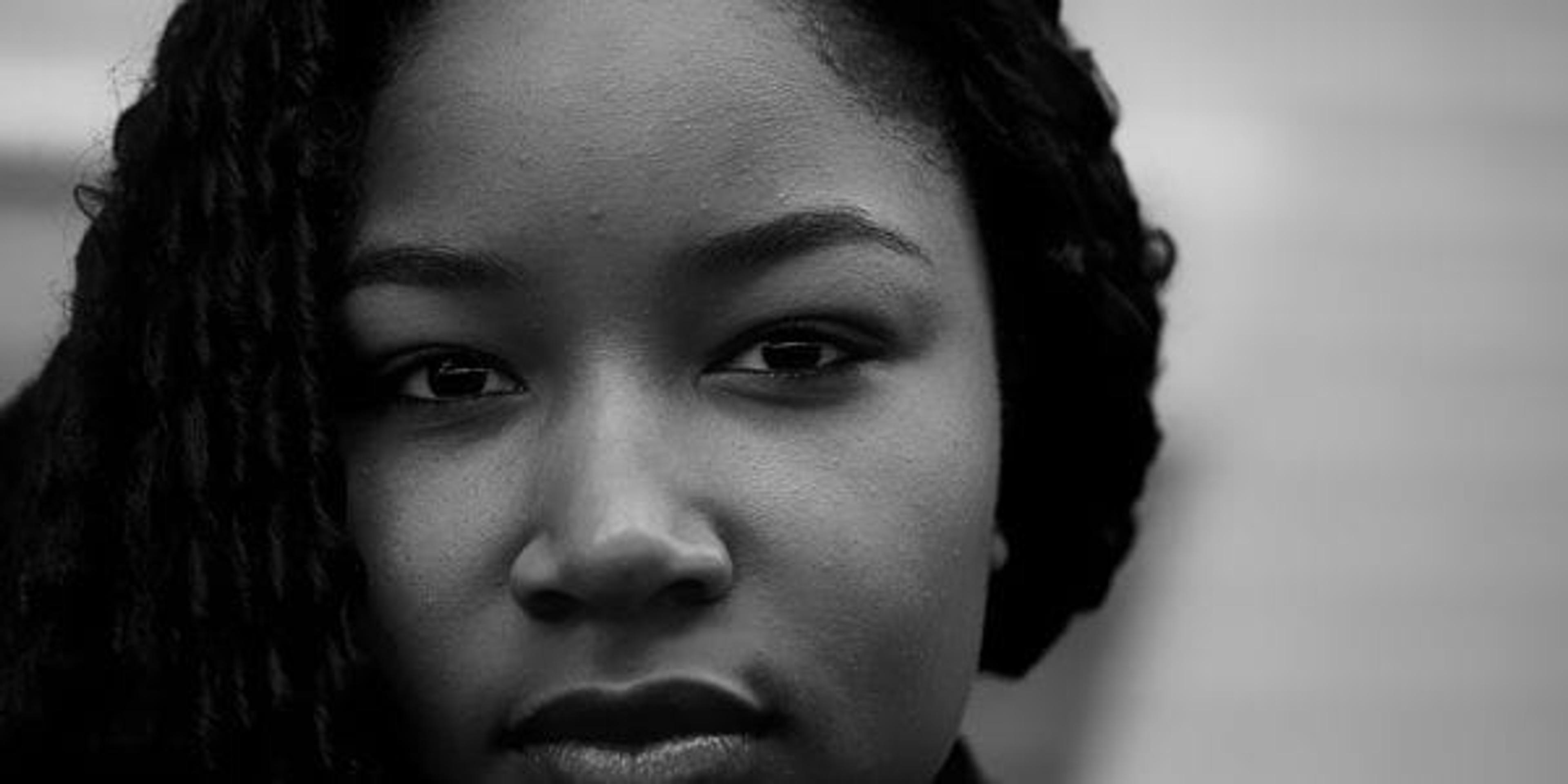 Black and white portrait of young black woman