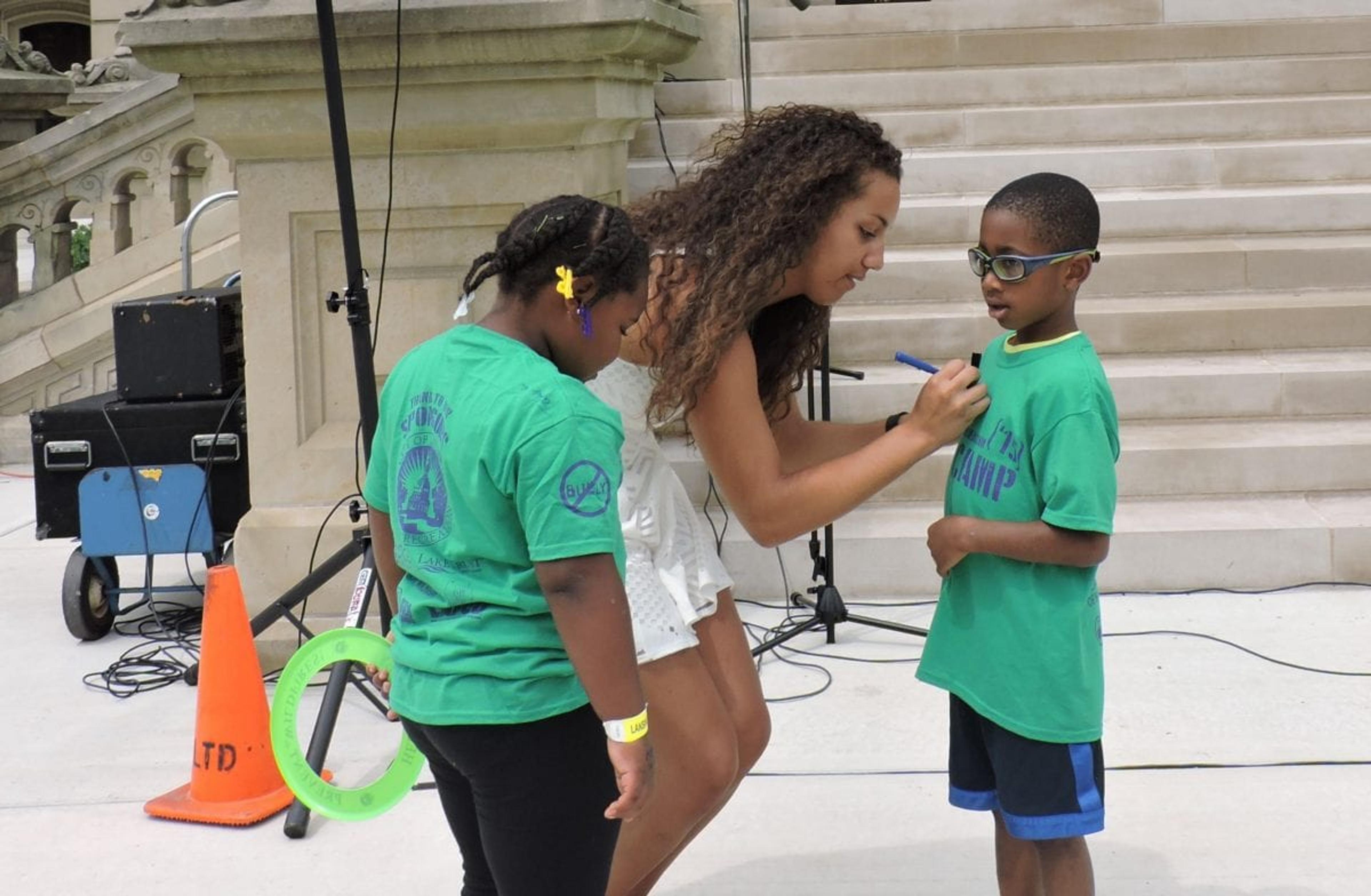 Musician Taylor Taylor signing autographs for her new fans. 