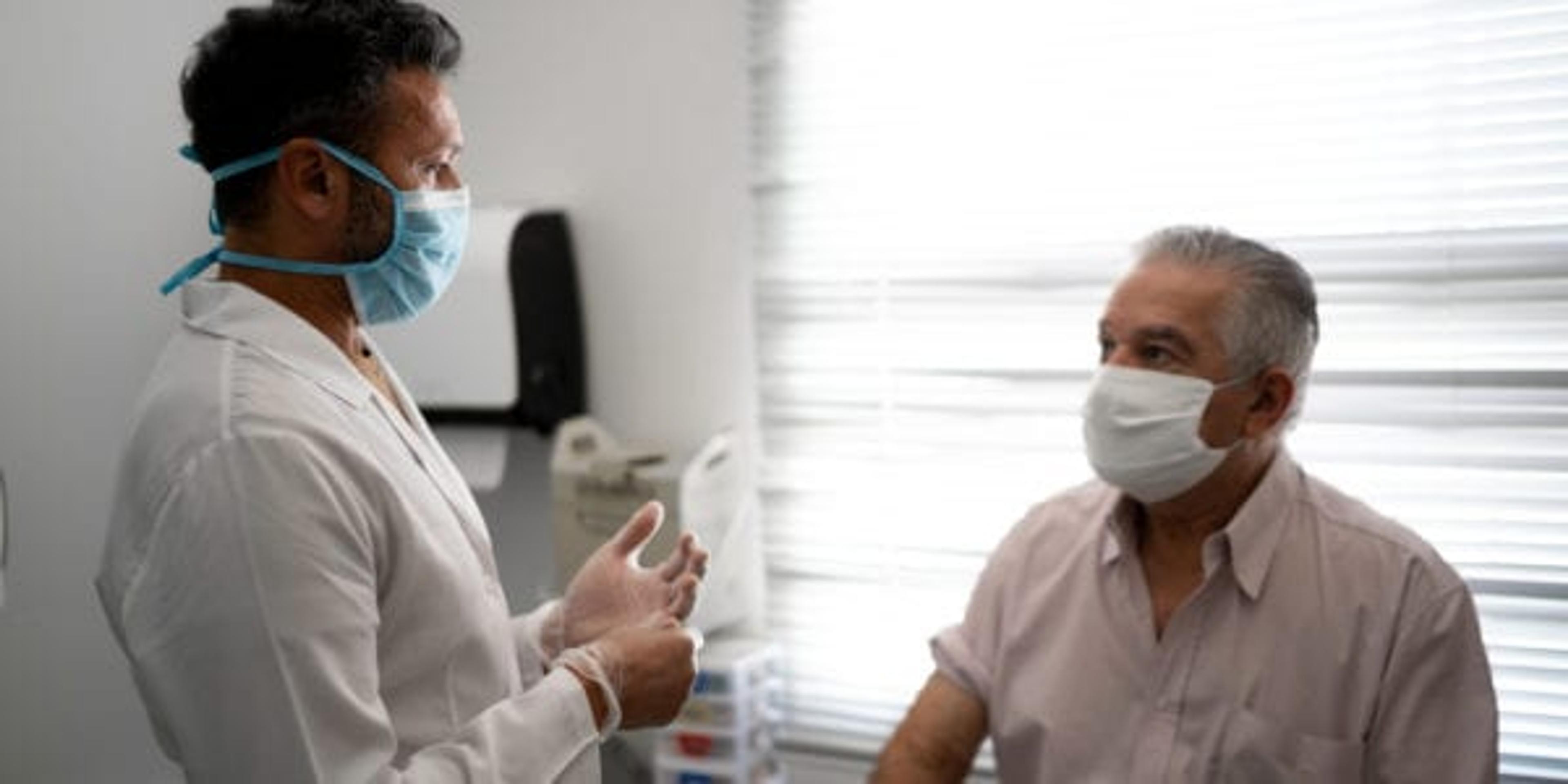 Patient in a medical consult wearing face mask