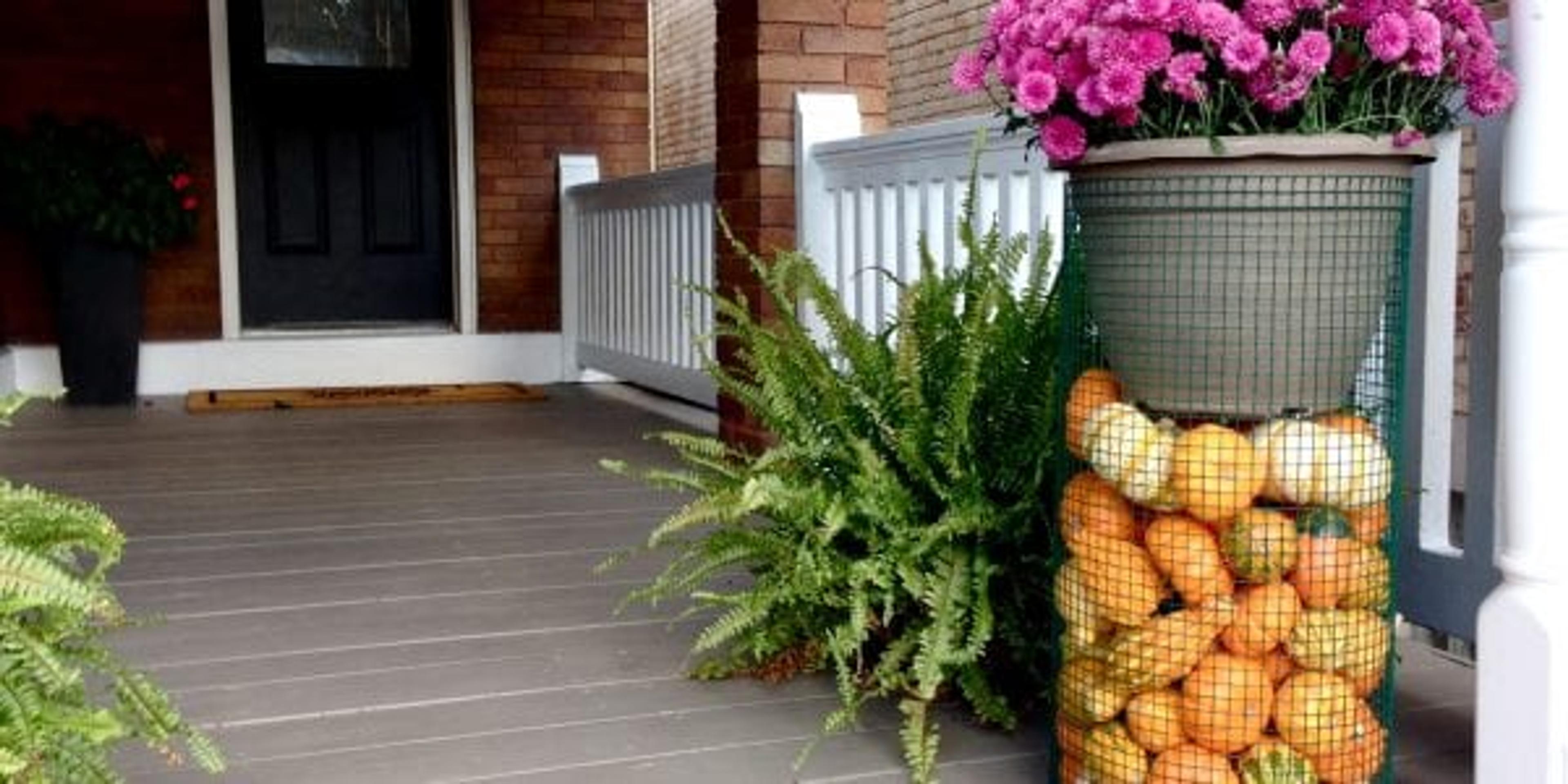 Front porch decorated for fall