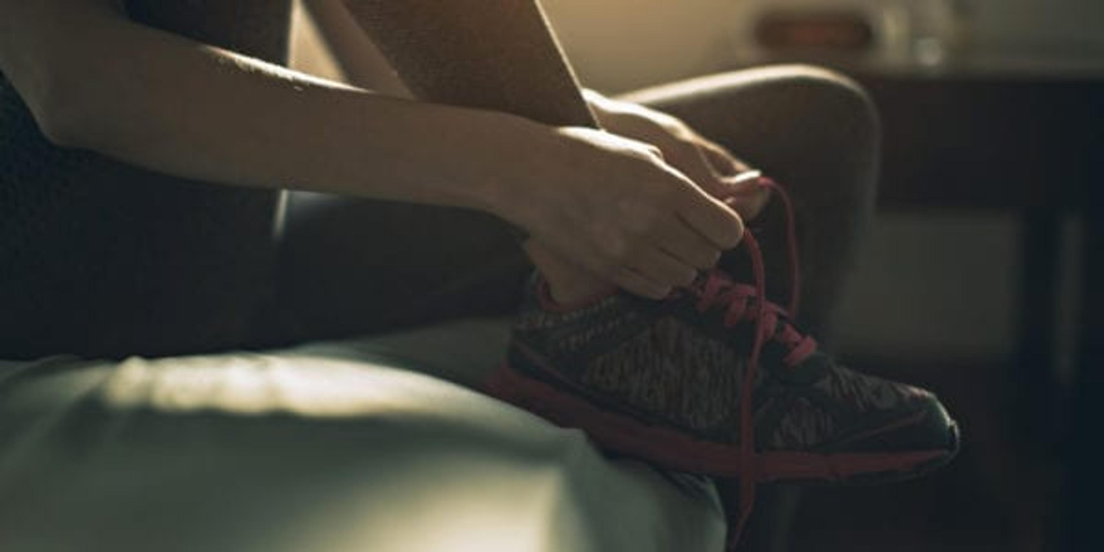 Young woman getting ready for morning run