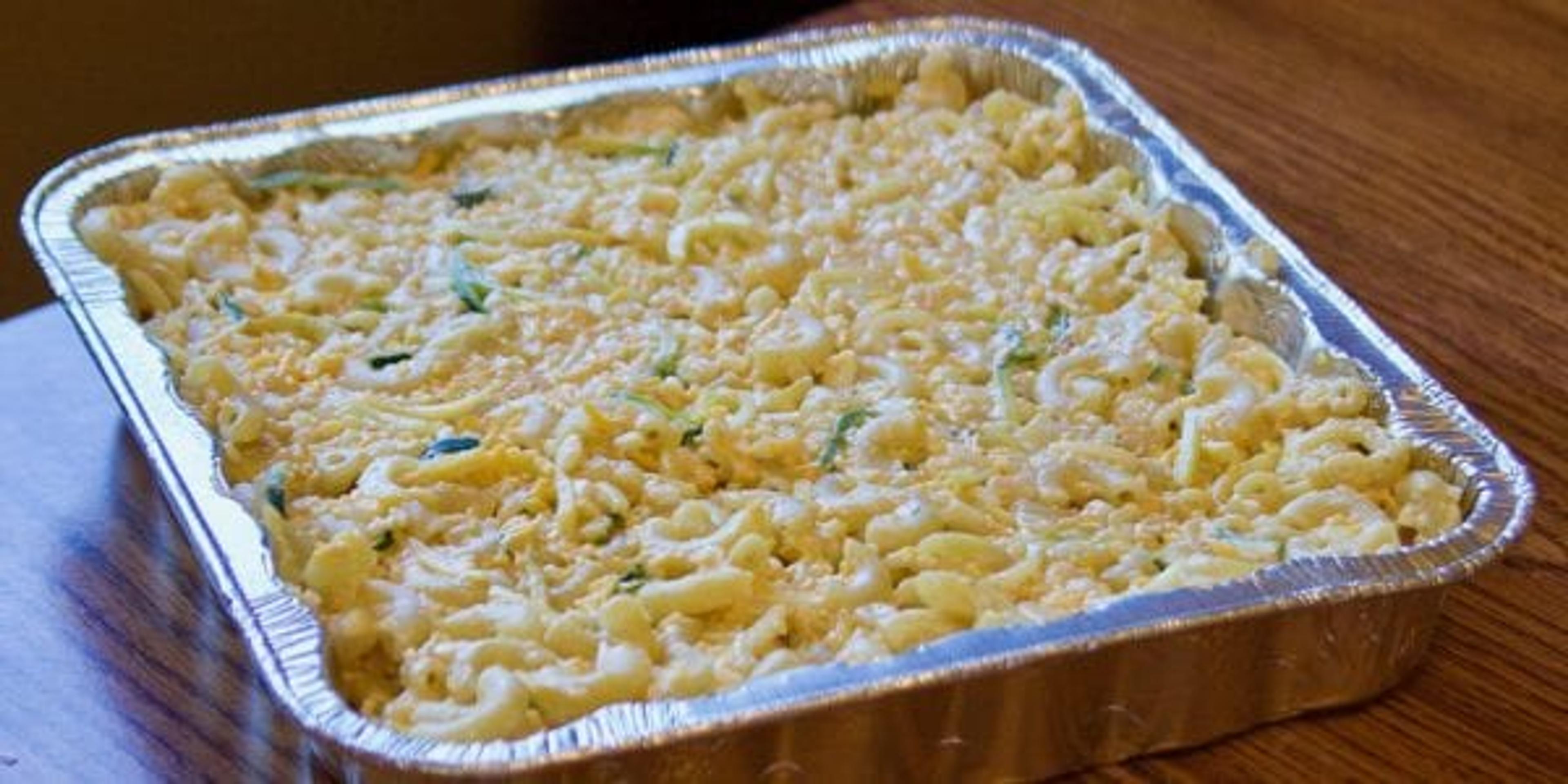 Mac and cheese in a pan, on a table