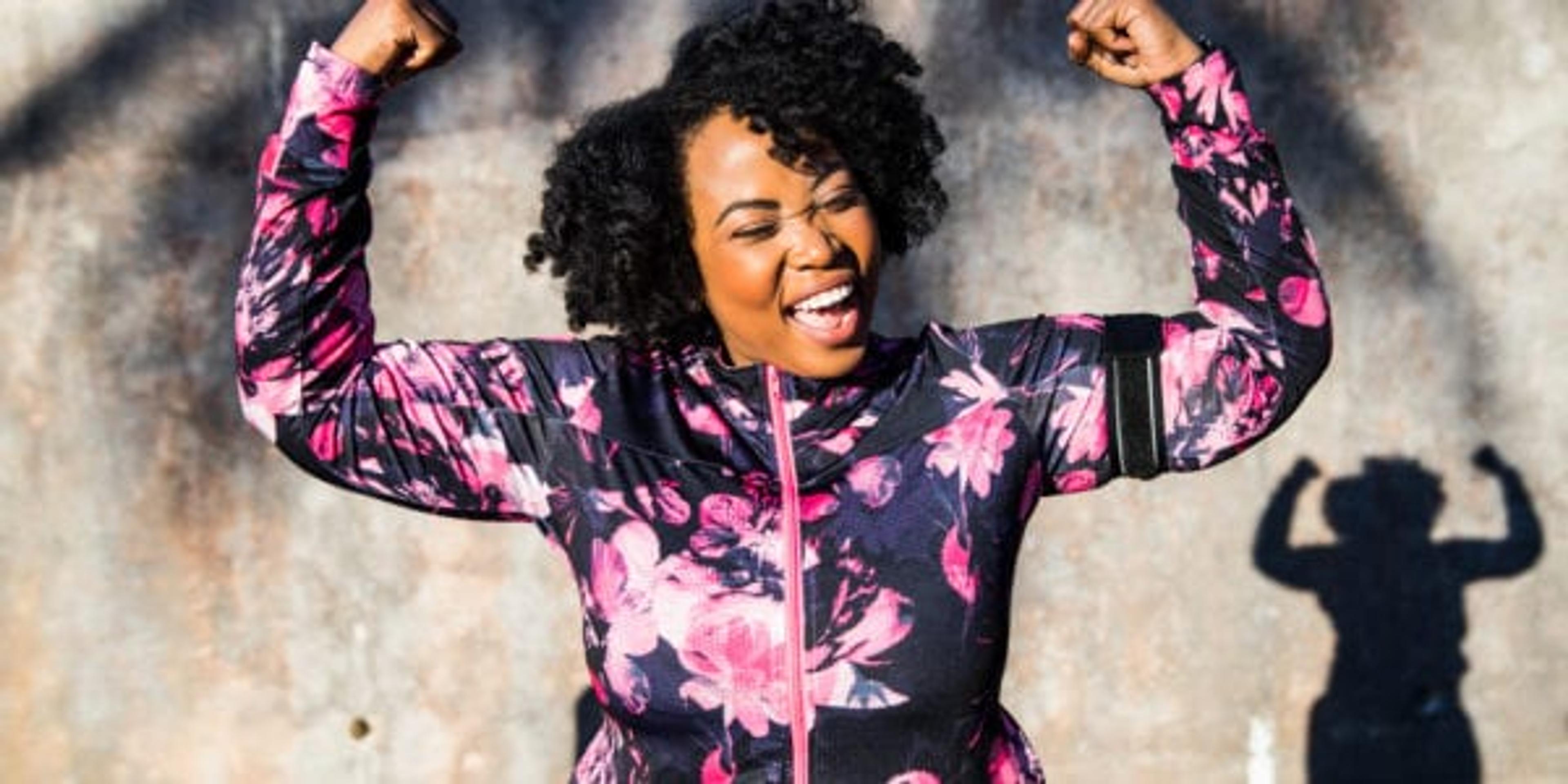 Funny portrait of a young black curvy woman during a training session