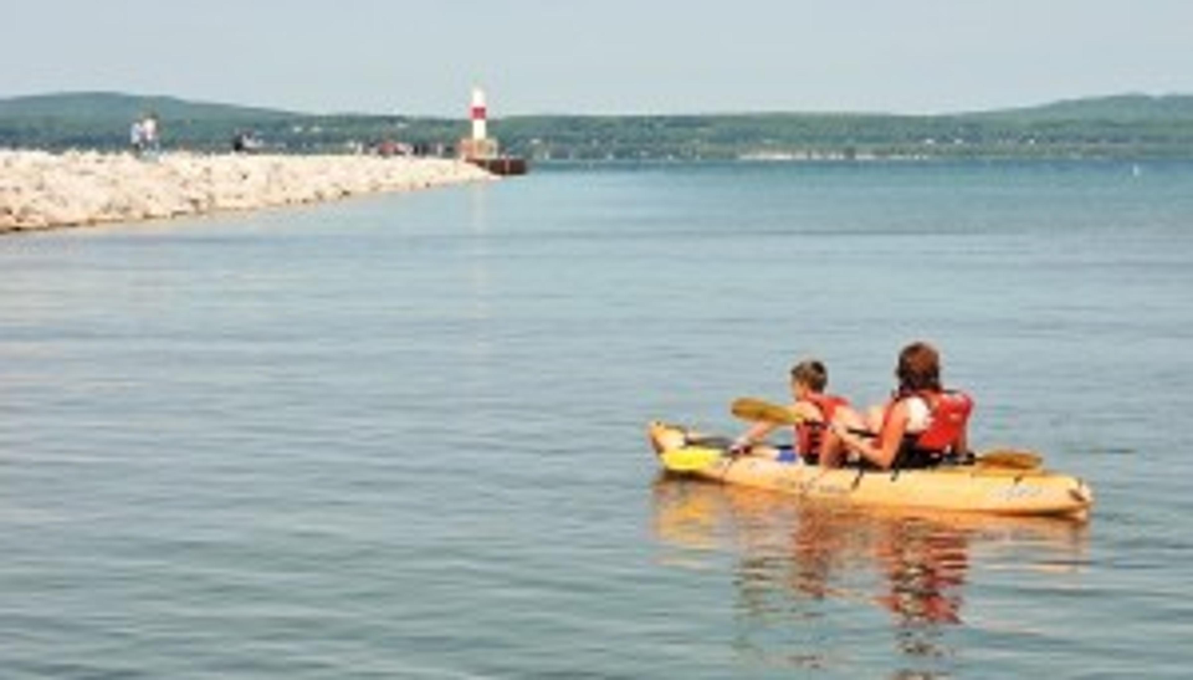 Kayakers taking advantage of free demonstrations at this year's Petoskey Festival on the Bay.