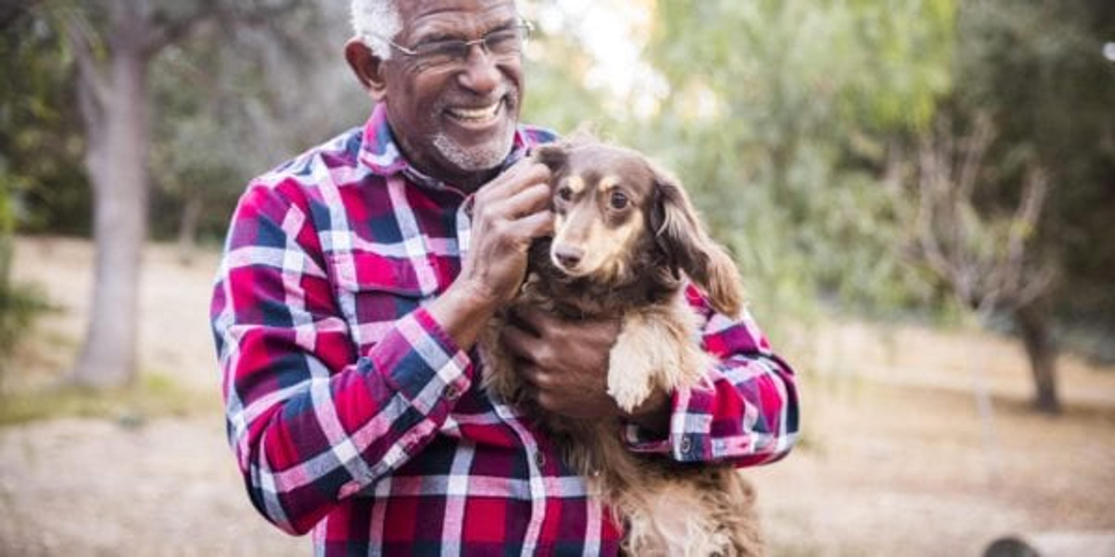 Man holding his dog